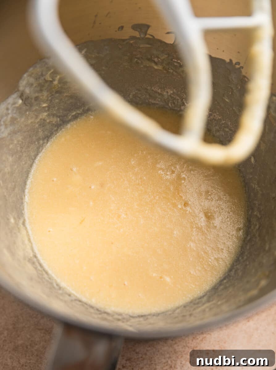Fluffy Buttermilk Cinnamon Rolls from Scratch 6 Buttermilk cinnamon roll mixture in bowl before addition of the flour.