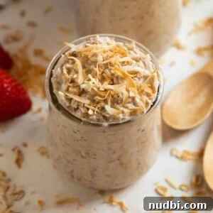 Coconut Cream Pie Overnight Oats Recipe for Creamy Breakfast 5 Coconut cream pie overnight oatmeal in a jar topped with toasted coconut.