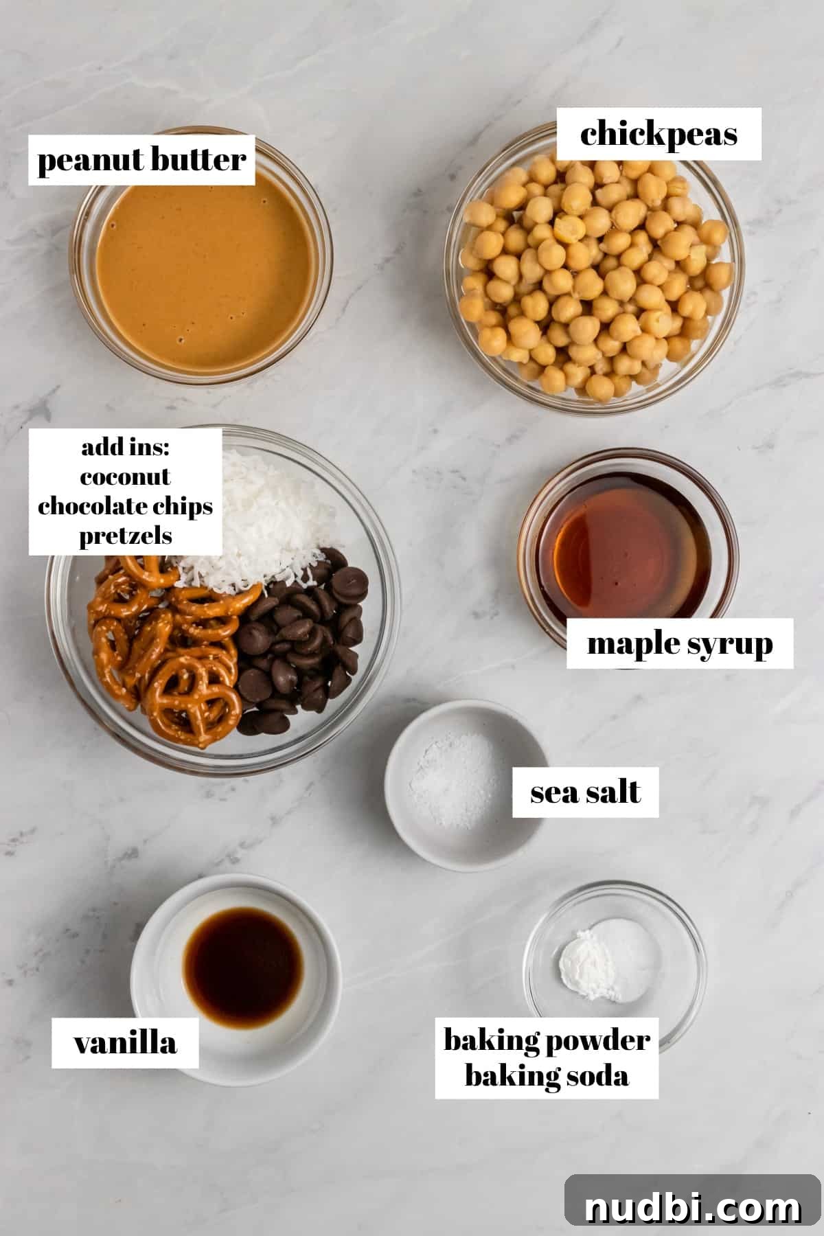 Peanut Butter Chickpea Blondies Recipe — High-Protein Treat 3 Chickpeas, peanut butter, maple and ingredients labeled on counter.