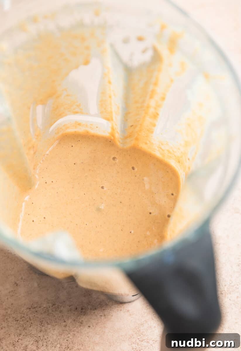 Fluffy Banana Oat Blender Pancakes in Minutes 7 Banana oat blender pancake batter in blender.