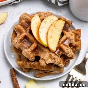 Cinnamon Apple Vegan Waffles — Fluffy Plant-Based Breakfast 5 Vegan waffles with apples and cinnamon.