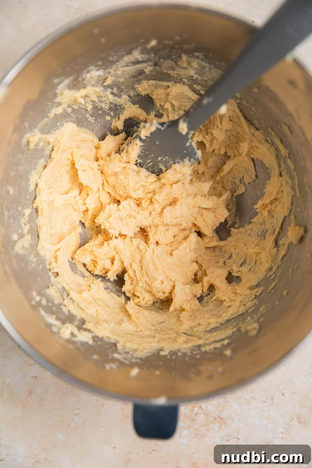 Nutella Thumbprint Cookies Recipe — Gooey Chocolate Hazelnut Treats 6 Cookie dough in mixing bowl with just wet ingredients combined.