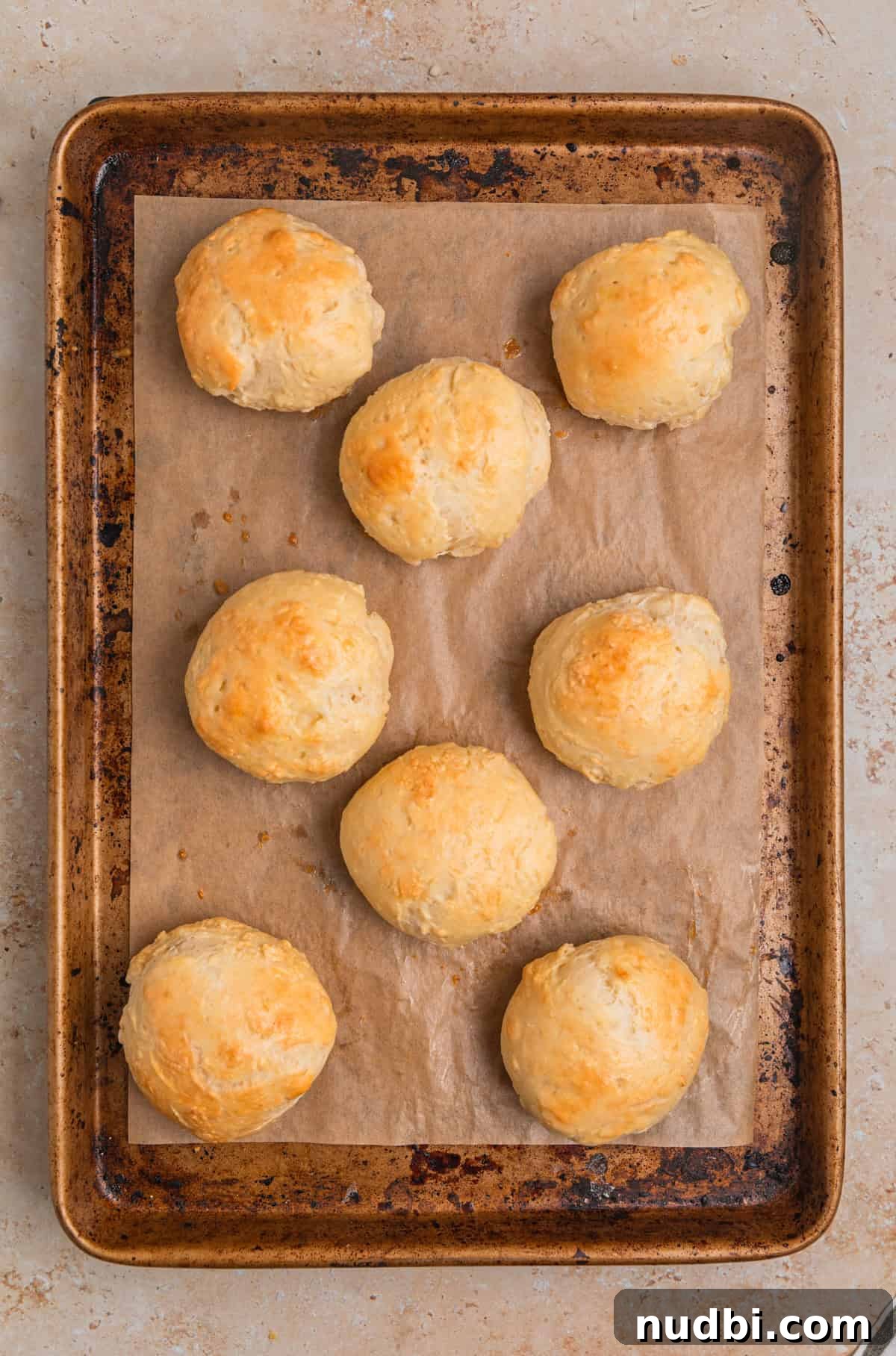 Quick No-Yeast Dinner Rolls Recipe for Soft, Fast Bread 10 Baked no yeast dinner rolls on baking sheet.