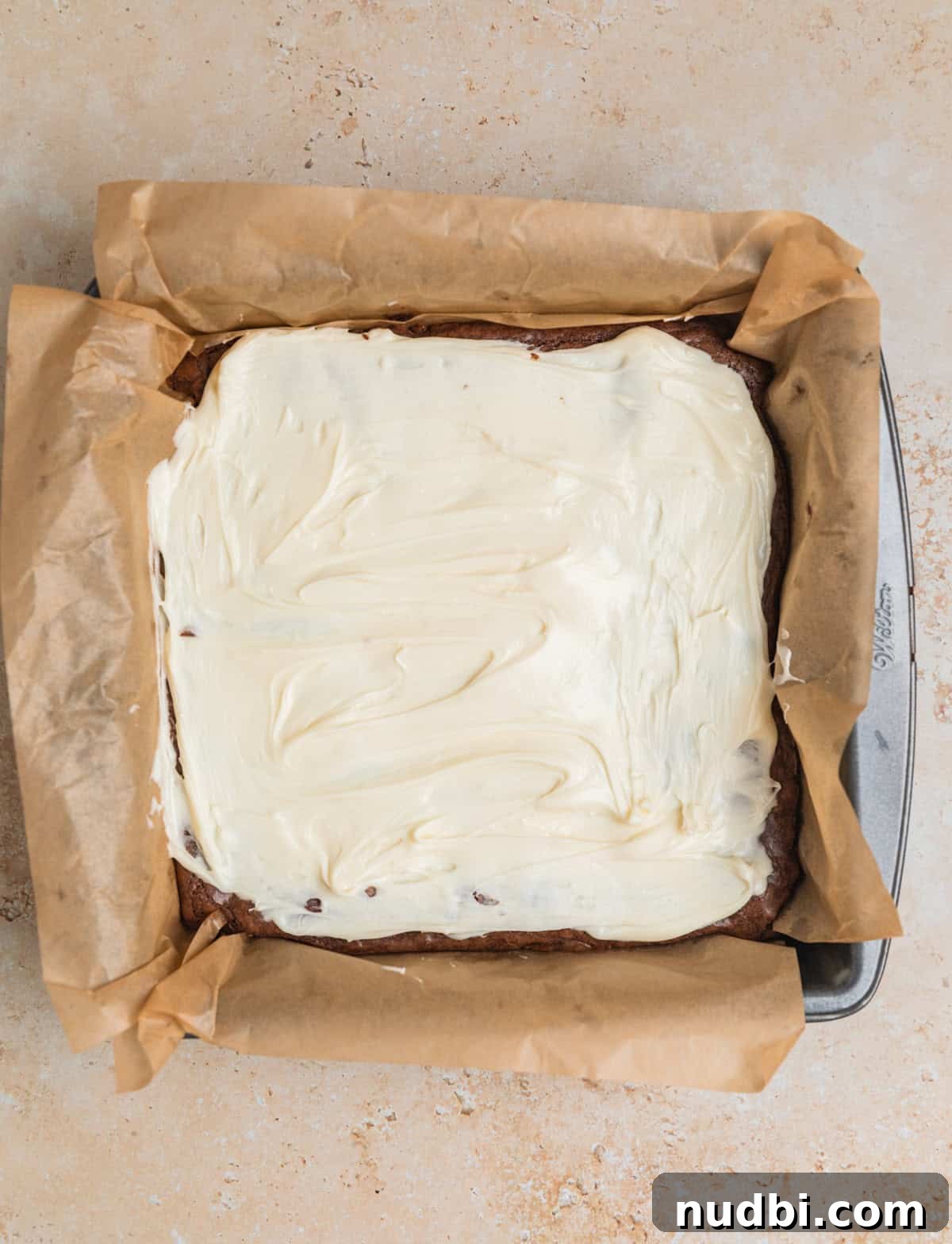Peppermint Bark Brownies Recipe: Fudgy Chocolate Mint Bars 11 Peppermint white chocolate mixture spread over brownies.