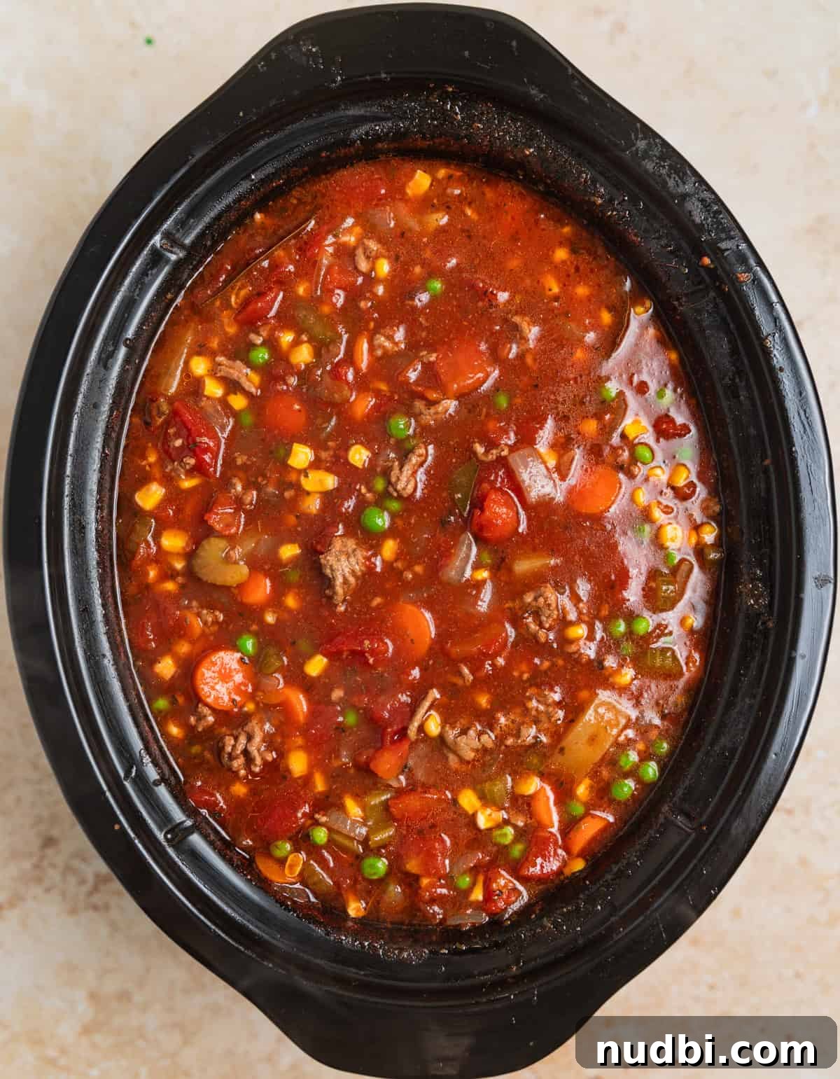 Slow Cooker Hamburger Soup Recipe for Hearty Weeknight Meals 8 Crockpot hamburger soup in crockpot after fully cooked.