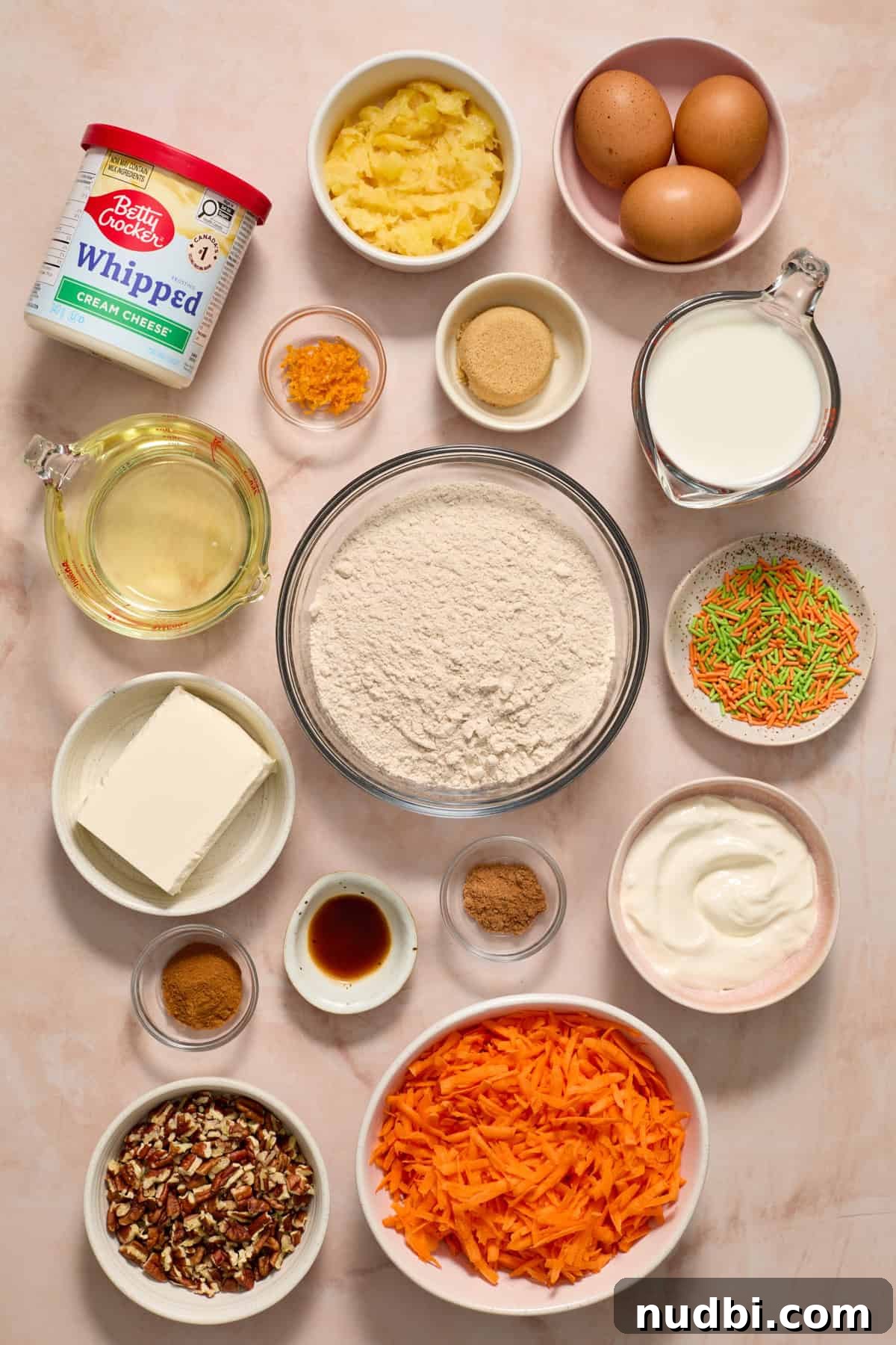 Moist Carrot Cake Recipe Using Cake Mix 3 Boxed carrot cake mix ingredients on surface.