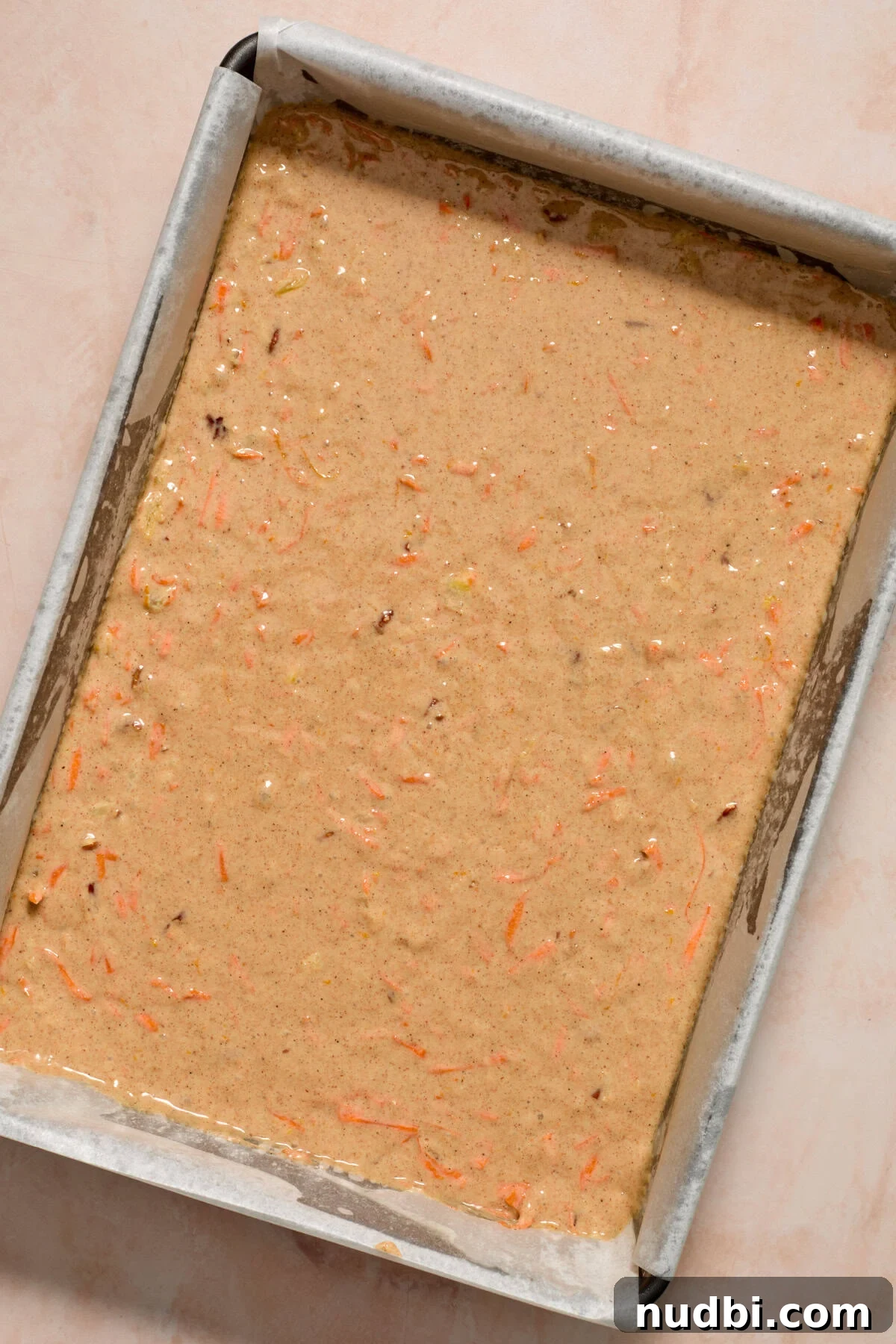 Moist Carrot Cake Recipe Using Cake Mix 8 Carrot cake batter in greased glass pan.