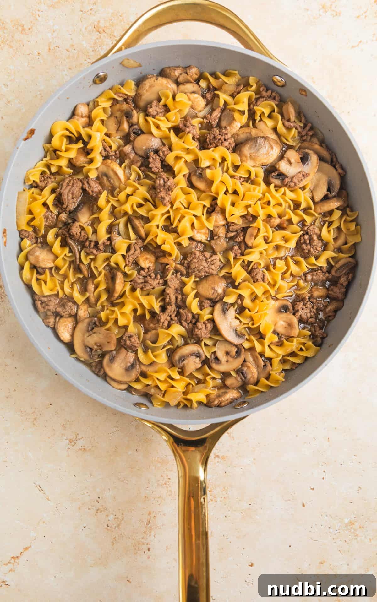 Creamy One-Pot Ground Beef Stroganoff Recipe 8 Pasta and beef stroganoff in skillet.