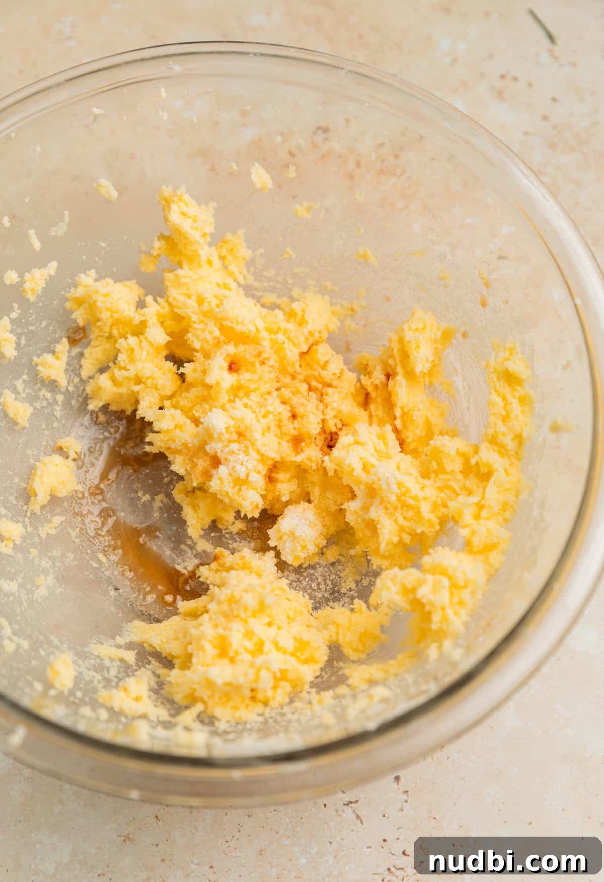 Almond Flour Orange Cookies Recipe — Light Citrus Cookie Guide 4 Creamed butter and sugar in glass bowl with salt and vanilla added.