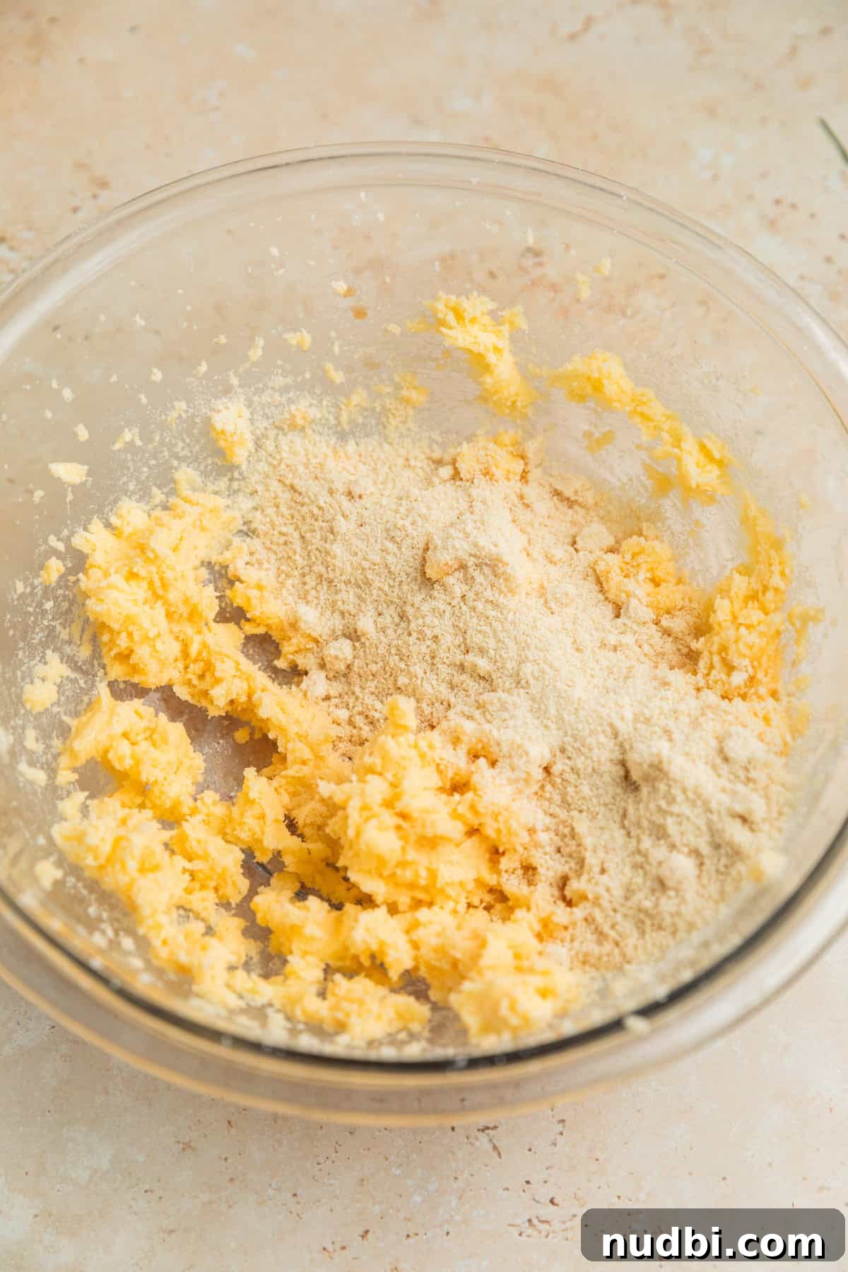 Almond Flour Orange Cookies Recipe — Light Citrus Cookie Guide 5 Almond flour added to bowl with creamed butter and sugar.
