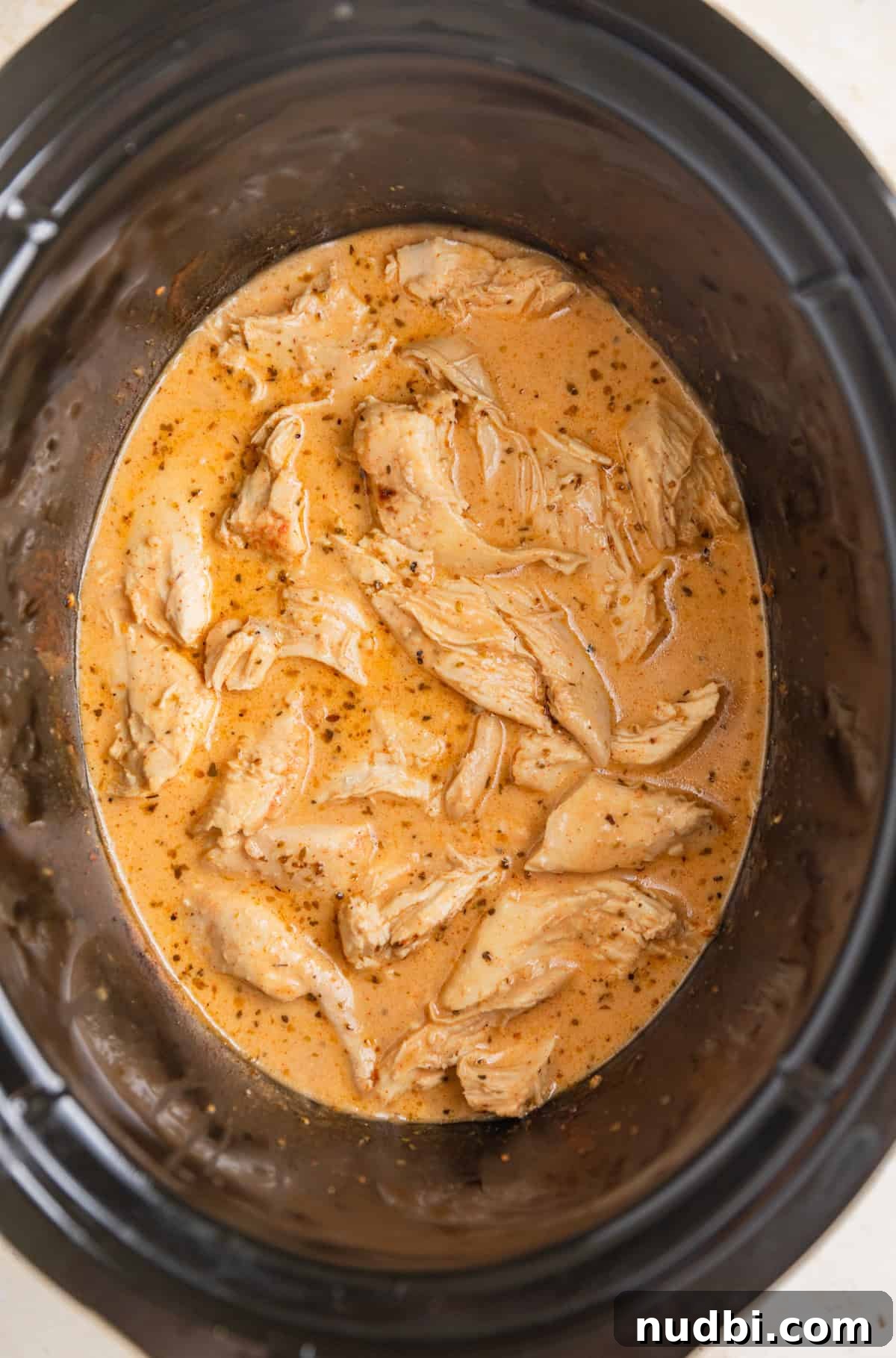 Slow Cooker Honey Mustard Chicken Recipe for Tender, Saucy Results 9 Cream added into honey mustard chicken in slow cooker.