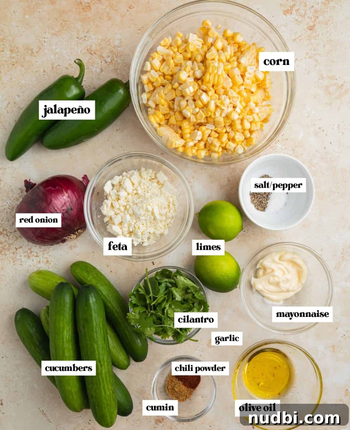Cucumber and Sweet Corn Salad with Herb Vinaigrette 3 Bowl of corn, onion, olive oil, limes and other ingredients for recipe.