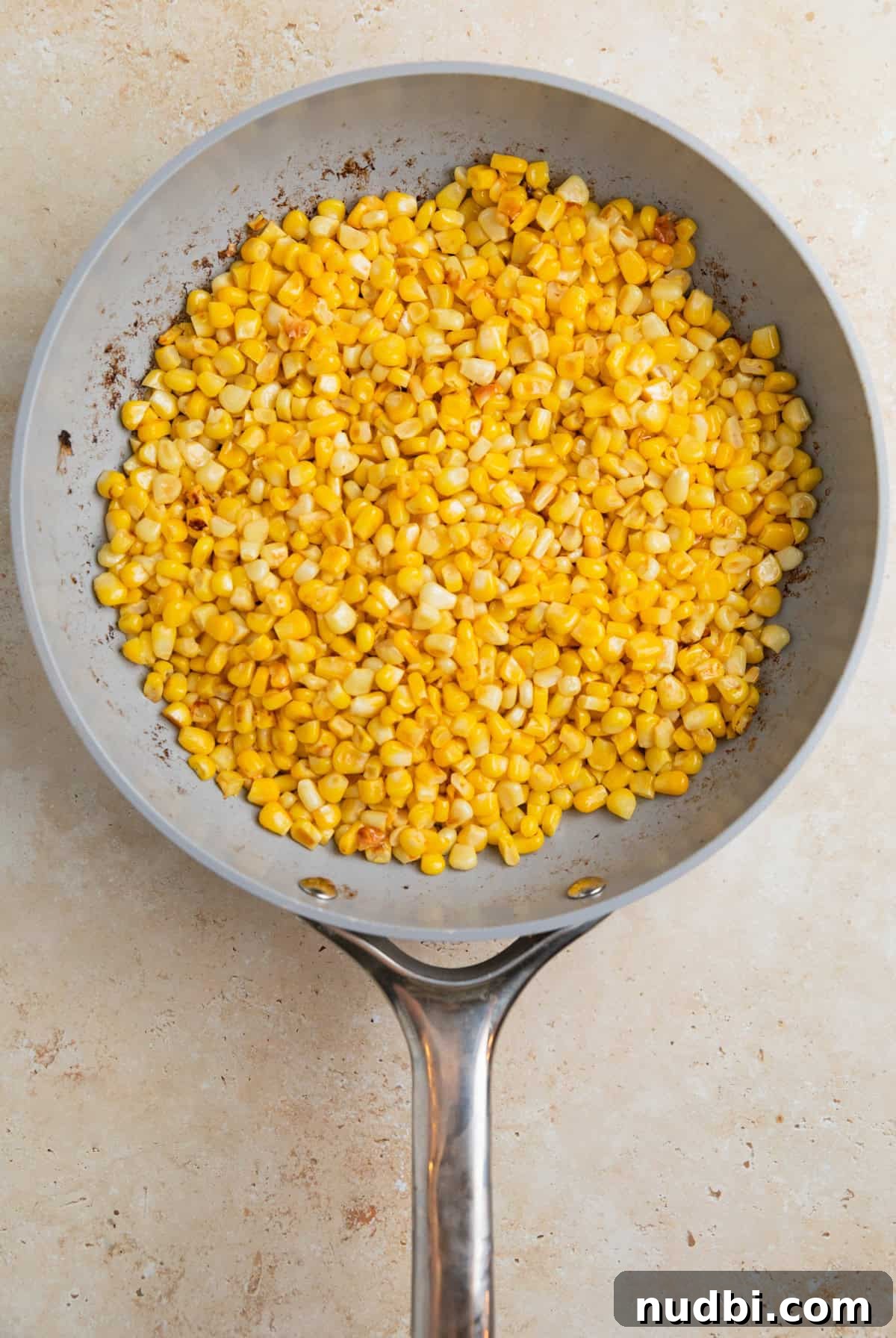 Cucumber and Sweet Corn Salad with Herb Vinaigrette 4 Corn kernels cooked in skillet.