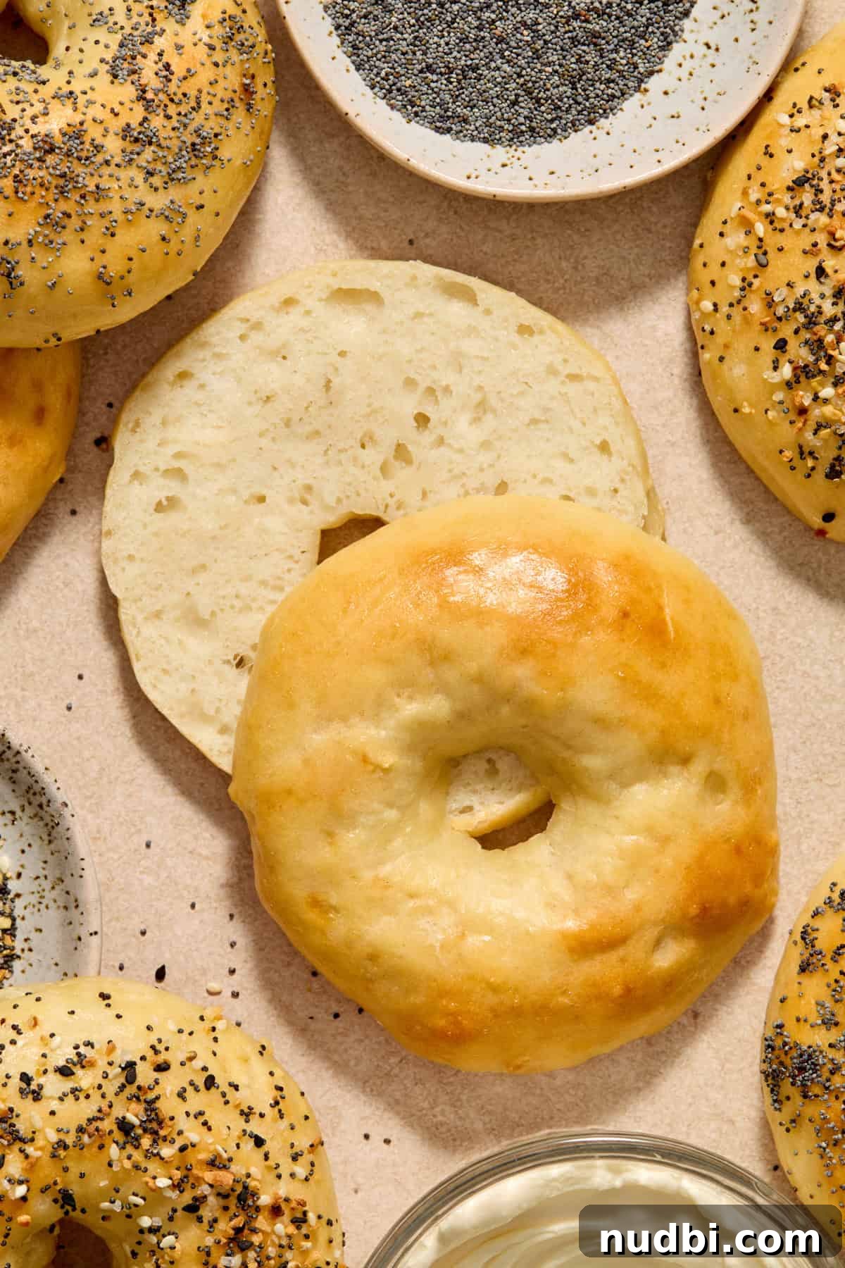 High-Protein Greek Yogurt Bagel Recipe 12 Greek yogurt protein bagel sliced in half to show the texture inside.