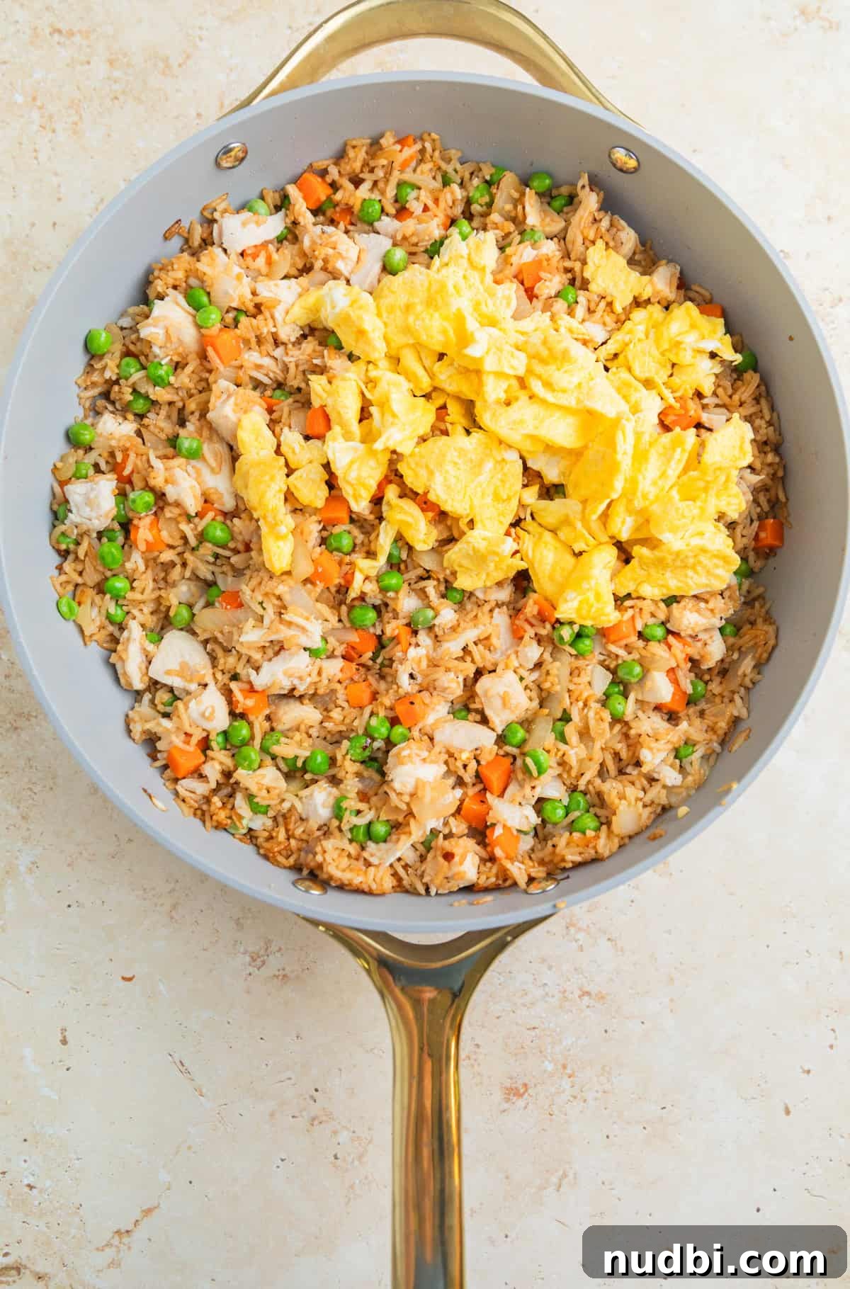 Quick Chicken Fried Rice Recipe for Perfect Weeknight Meals 8 Skillet with easy chicken fried rice and scrambled eggs added back in.