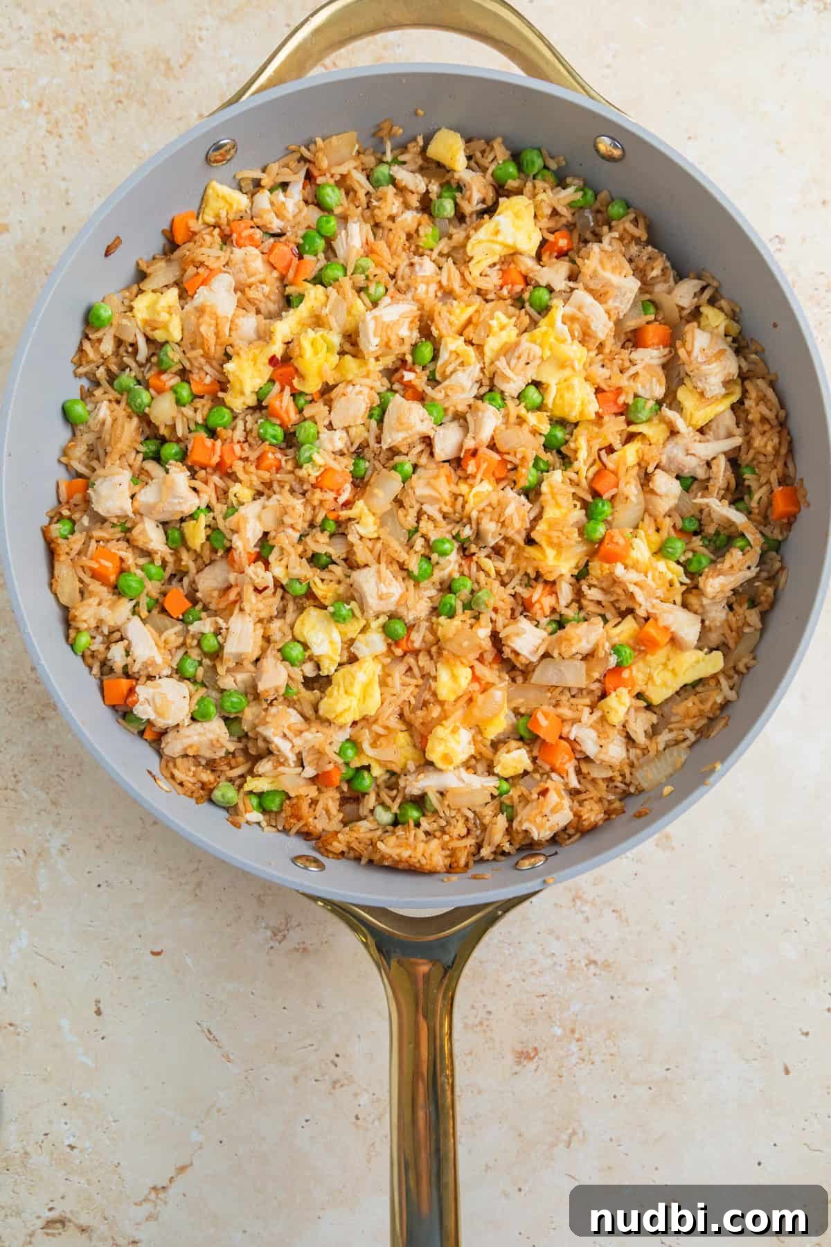 Quick Chicken Fried Rice Recipe for Perfect Weeknight Meals 9 Chicken fried rice in large skillet.