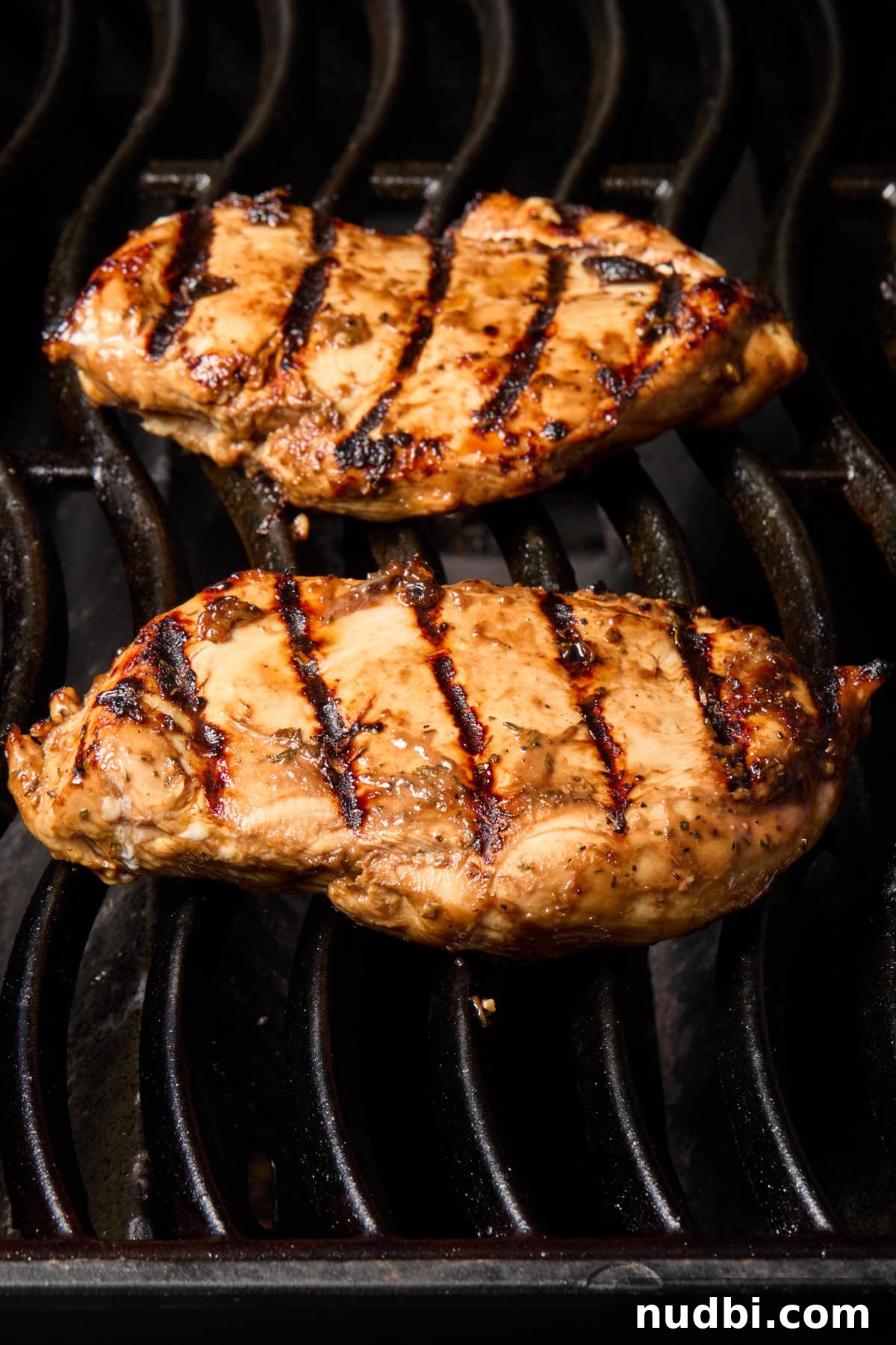 Chicken breast on grill.