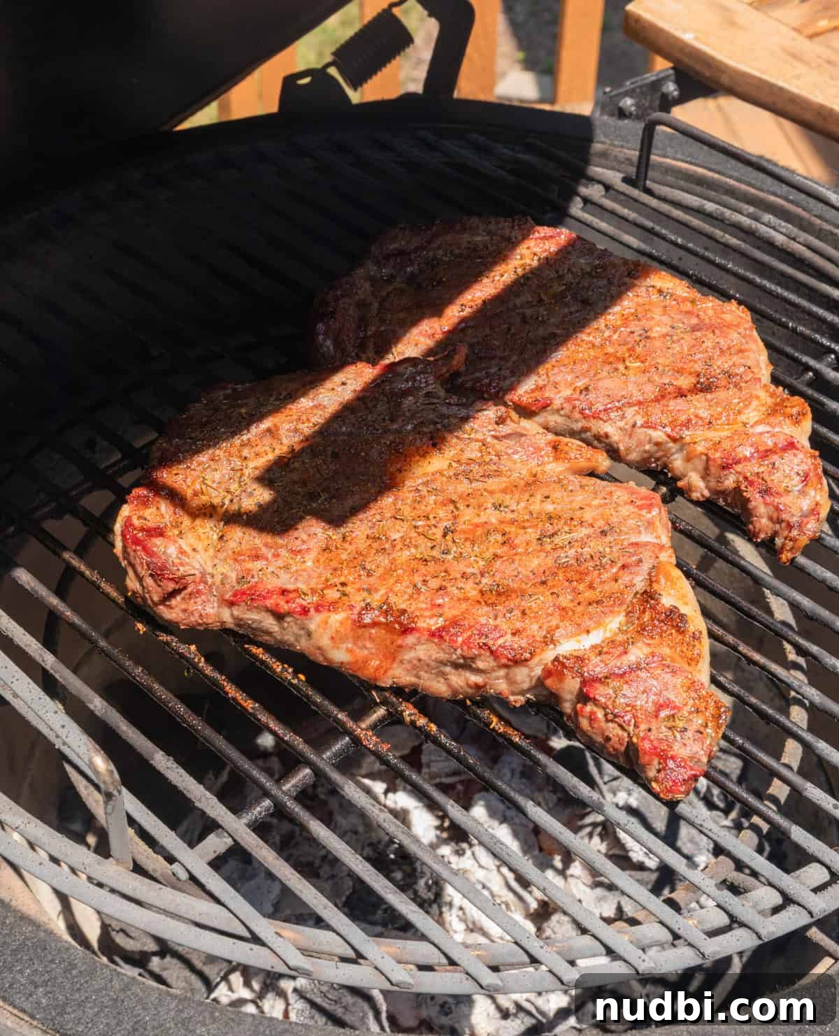 Grilled Ribeye with Creamy Gorgonzola Sauce Recipe 8 Ribeye steaks on grill.