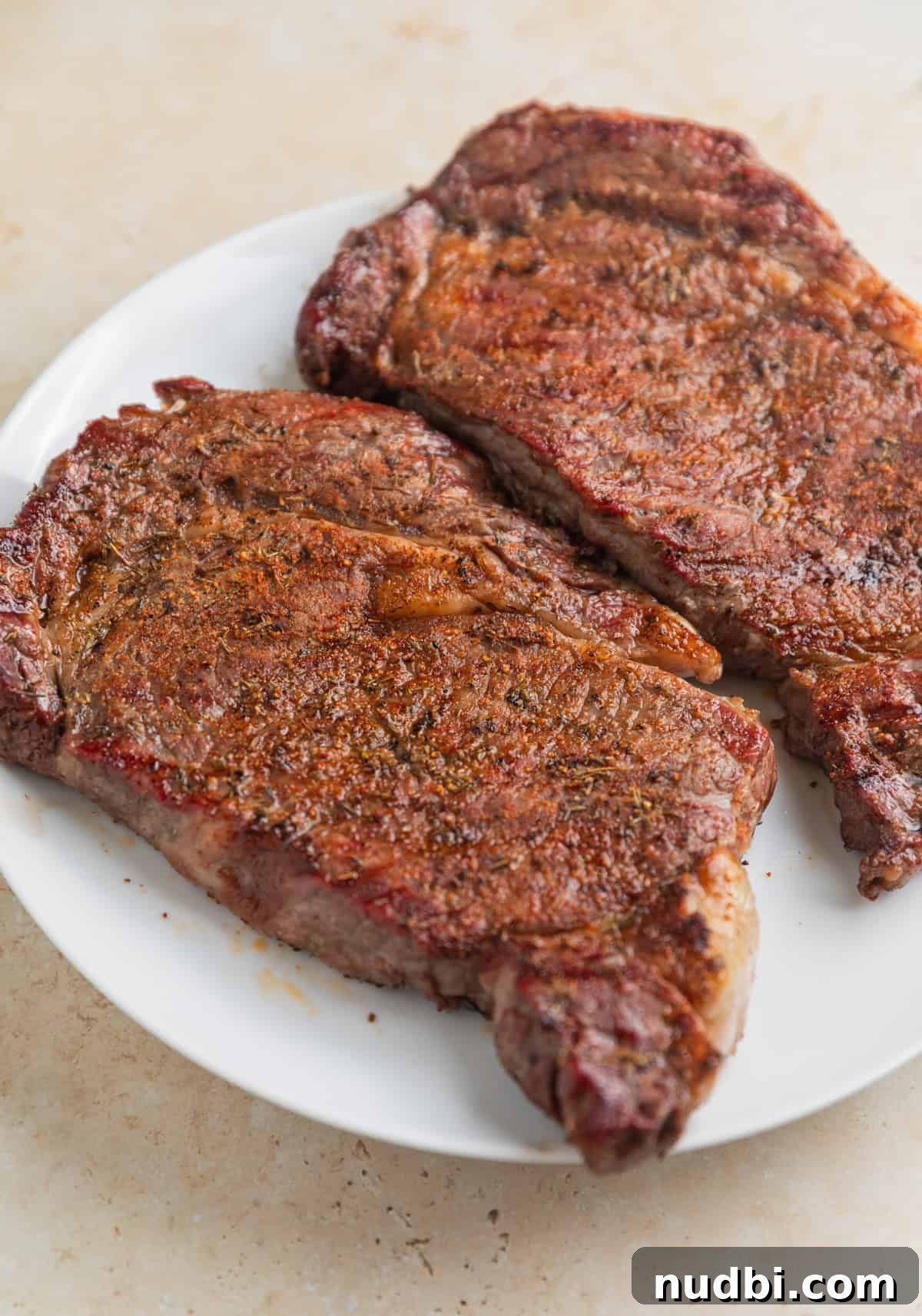 Grilled Ribeye with Creamy Gorgonzola Sauce Recipe 9 Resting grilled ribeye steaks.