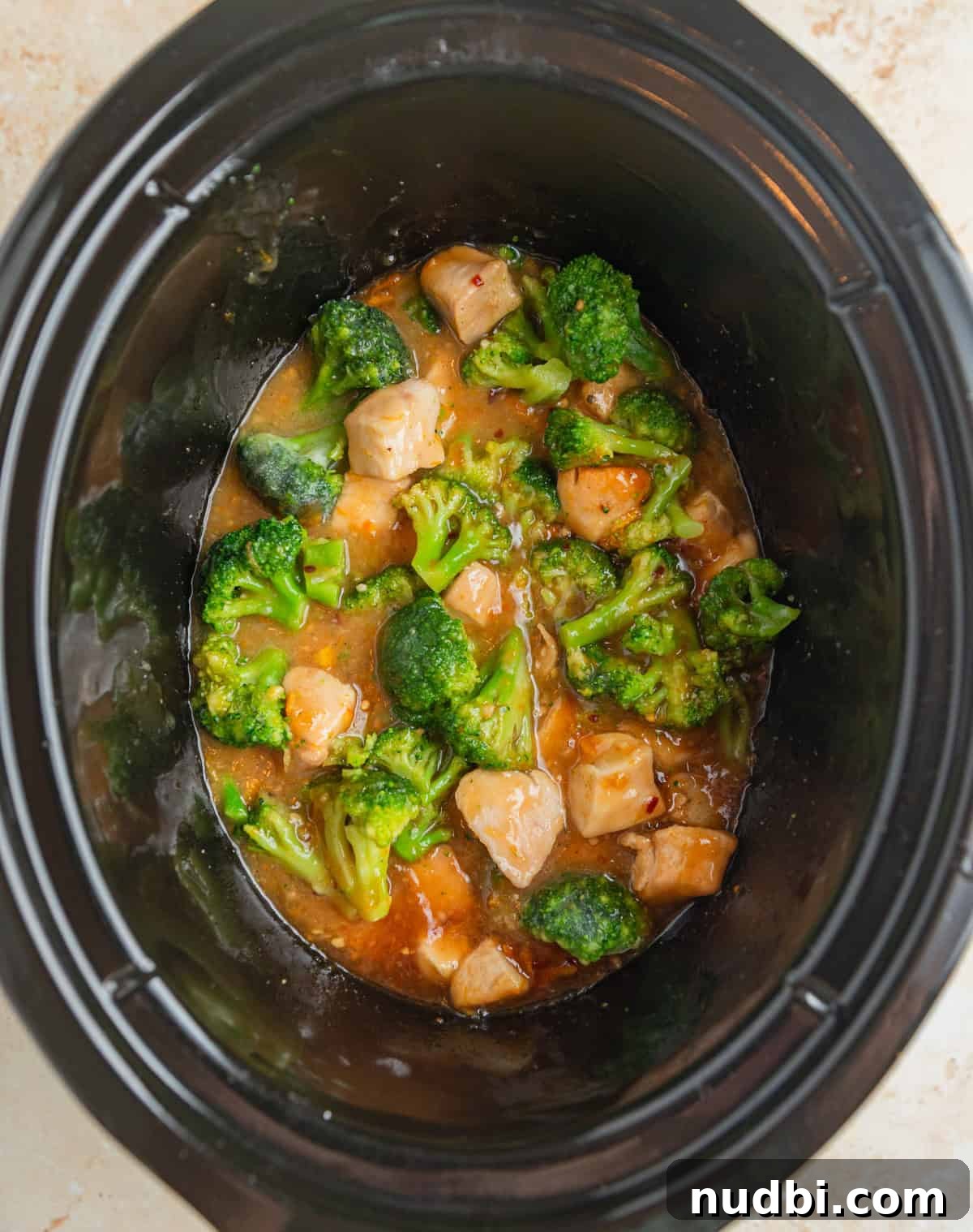 Slow-Cooker Orange Chicken Recipe for Tender, Saucy Chicken 10 Frozen broccoli added to chicken in crock pot.