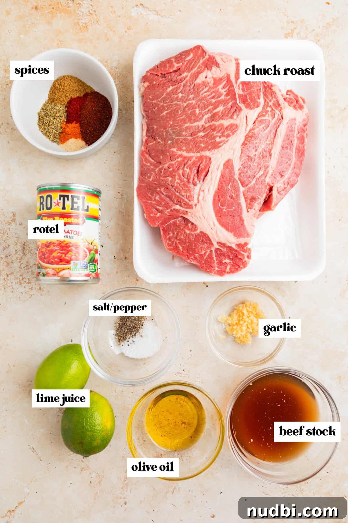 Slow-Cooker Shredded Beef Tacos Recipe for Tender, Flavorful Meat 3 Chuck roast, limes, spices and other labeled ingredients for recipe.