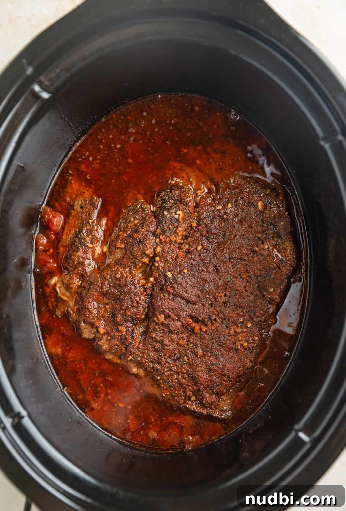 Slow-Cooker Shredded Beef Tacos Recipe for Tender, Flavorful Meat 7 Slow cooker beef cooked in juices in crockpot.