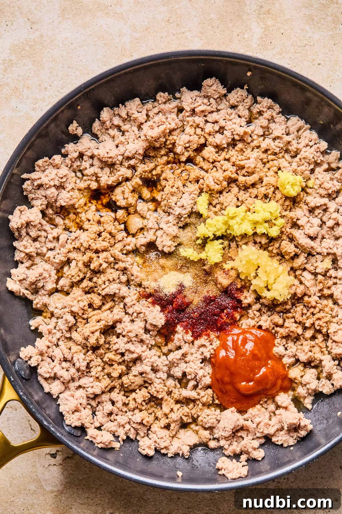 Savory Ground Turkey Rice Bowls with Veggies and Soy-Ginger Sauce 6 Seasoning added to ground turkey browned in skillet.