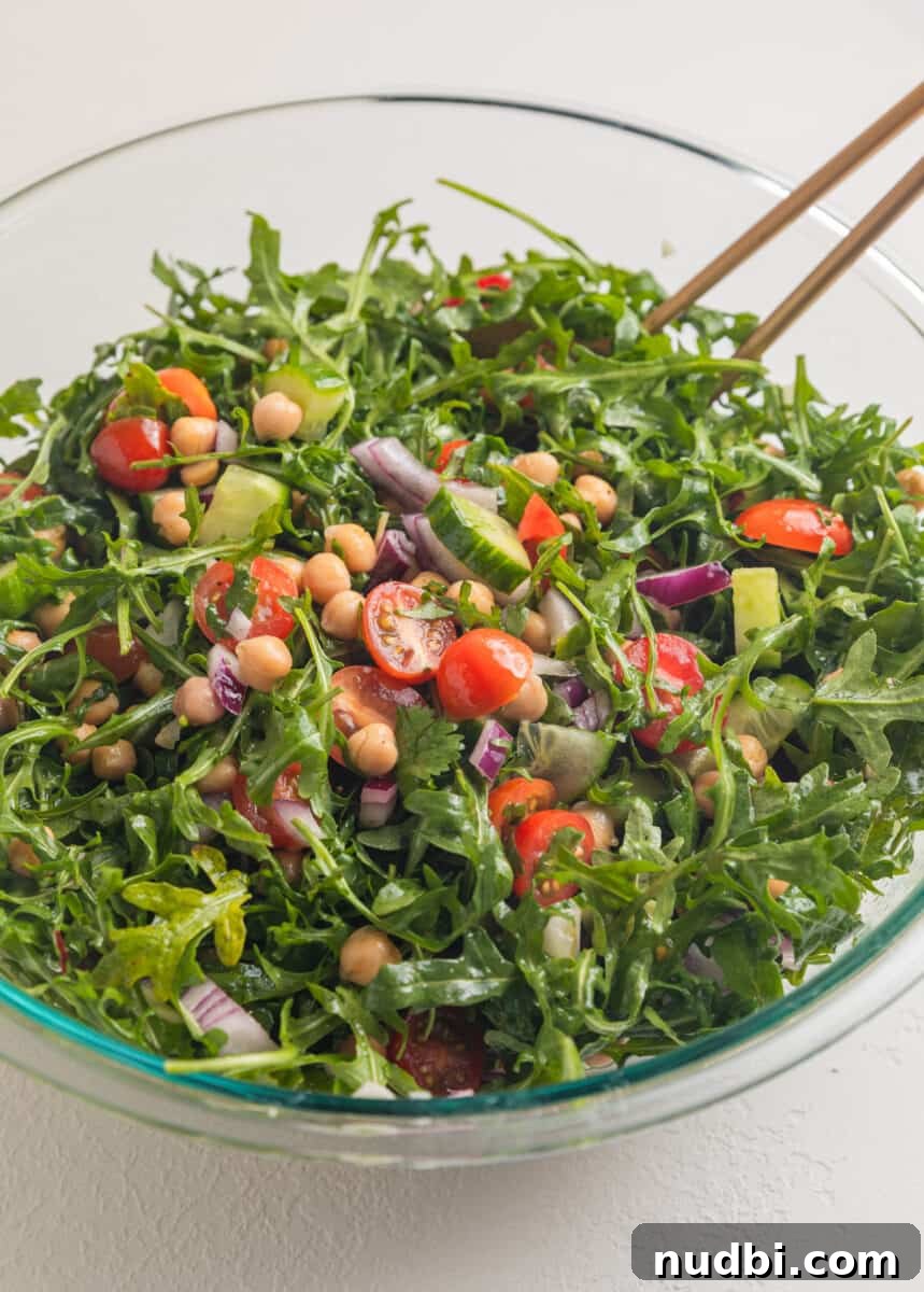 Creamy Chickpea and Avocado Salad with Lemon Dressing 5 Arugula, onion, tomato and cucumber tossed in large mixing bowl.