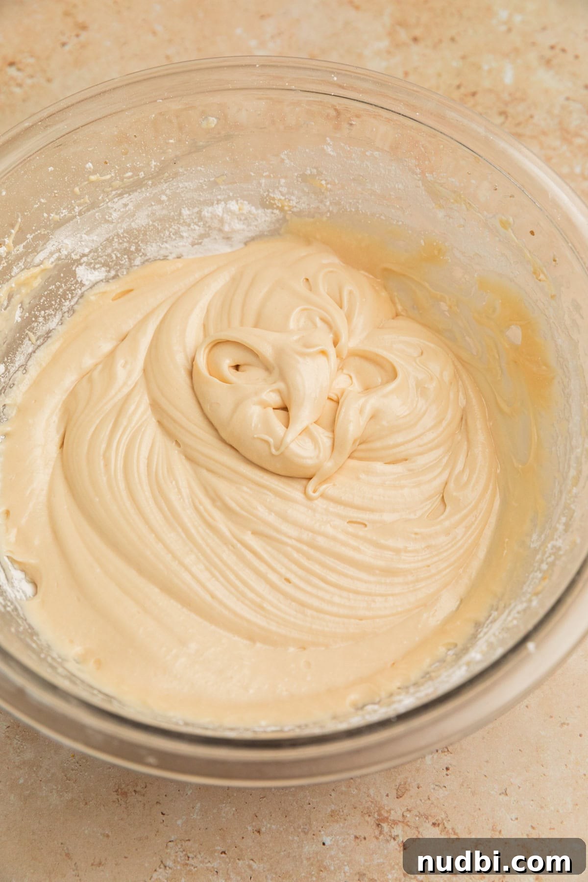 Pumpkin Bread Made from Cake Mix: Quick Moist Recipe 14 Brown sugar cream cheese icing in bowl.