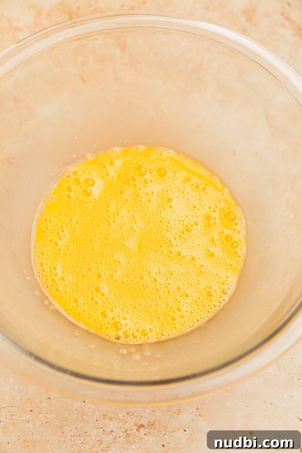 Pumpkin Bread Made from Cake Mix: Quick Moist Recipe 5 Whisked eggs in glass bowl.