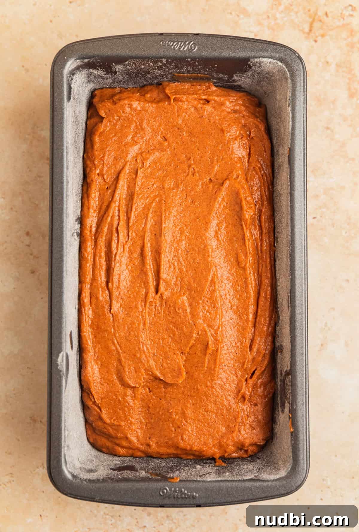 Pumpkin Bread Made from Cake Mix: Quick Moist Recipe 10 Pumpkin bread batter in greased and floured loaf pan.