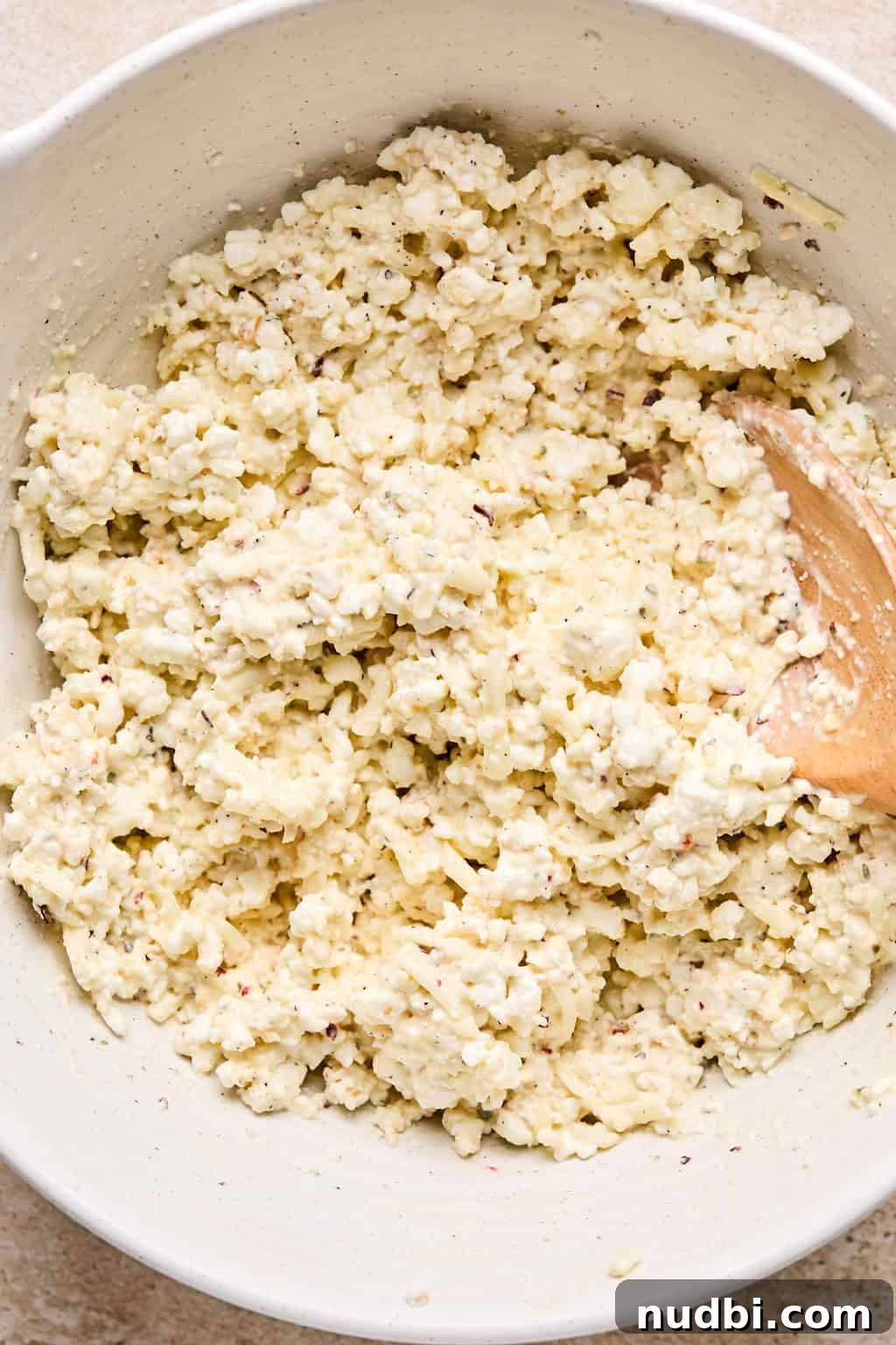 Spinach Baked Pasta with Creamy Cheese and Garlic 6 Cottage cheese mixture in bowl with seasoning.