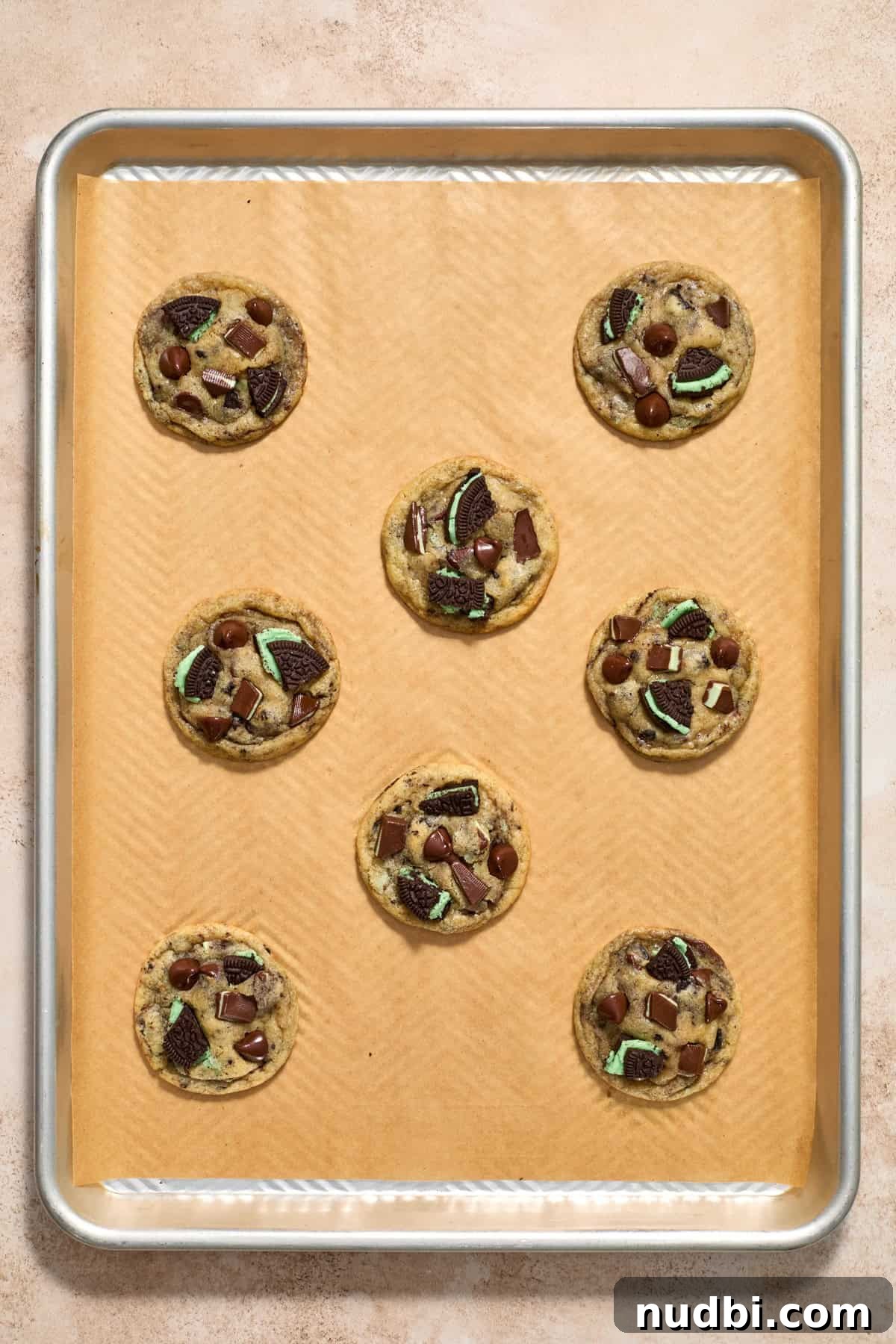 Chewy Mint Chocolate Chip Cookies Recipe for Perfect Cookies 13 Mint chocolate chip cookies baked on parchment lined pan.