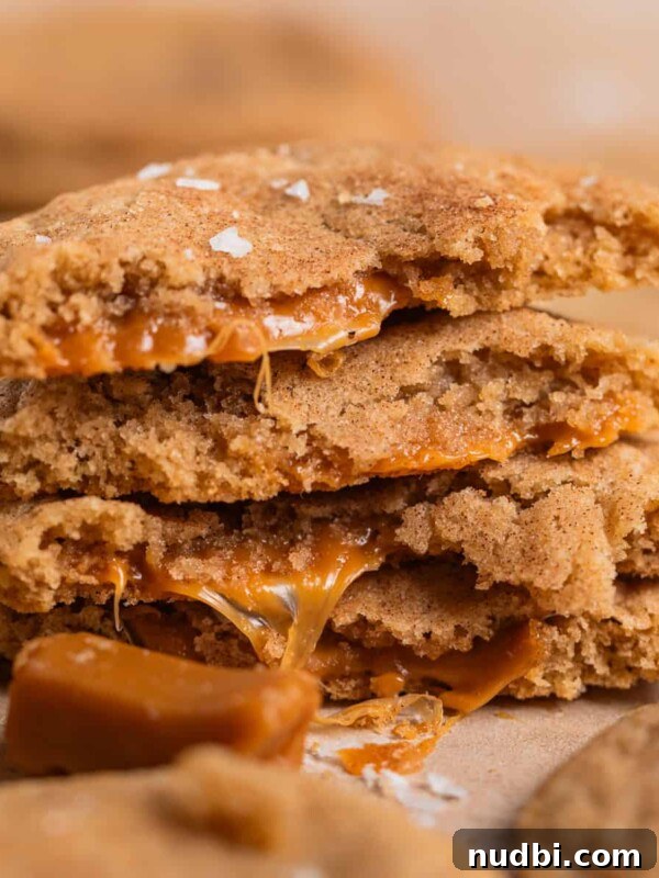 Chewy Mint Chocolate Chip Cookies Recipe for Perfect Cookies 16 Stack of caramel filled cookies broken in half with caramel oozing out of the centers.