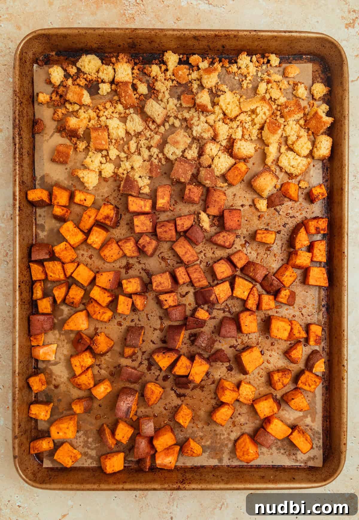 Roasted Sweet Potato and Kale Salad with Maple Dijon Dressing 7 Sheet pan with roasted sweet potatoes and cornbread croutons.