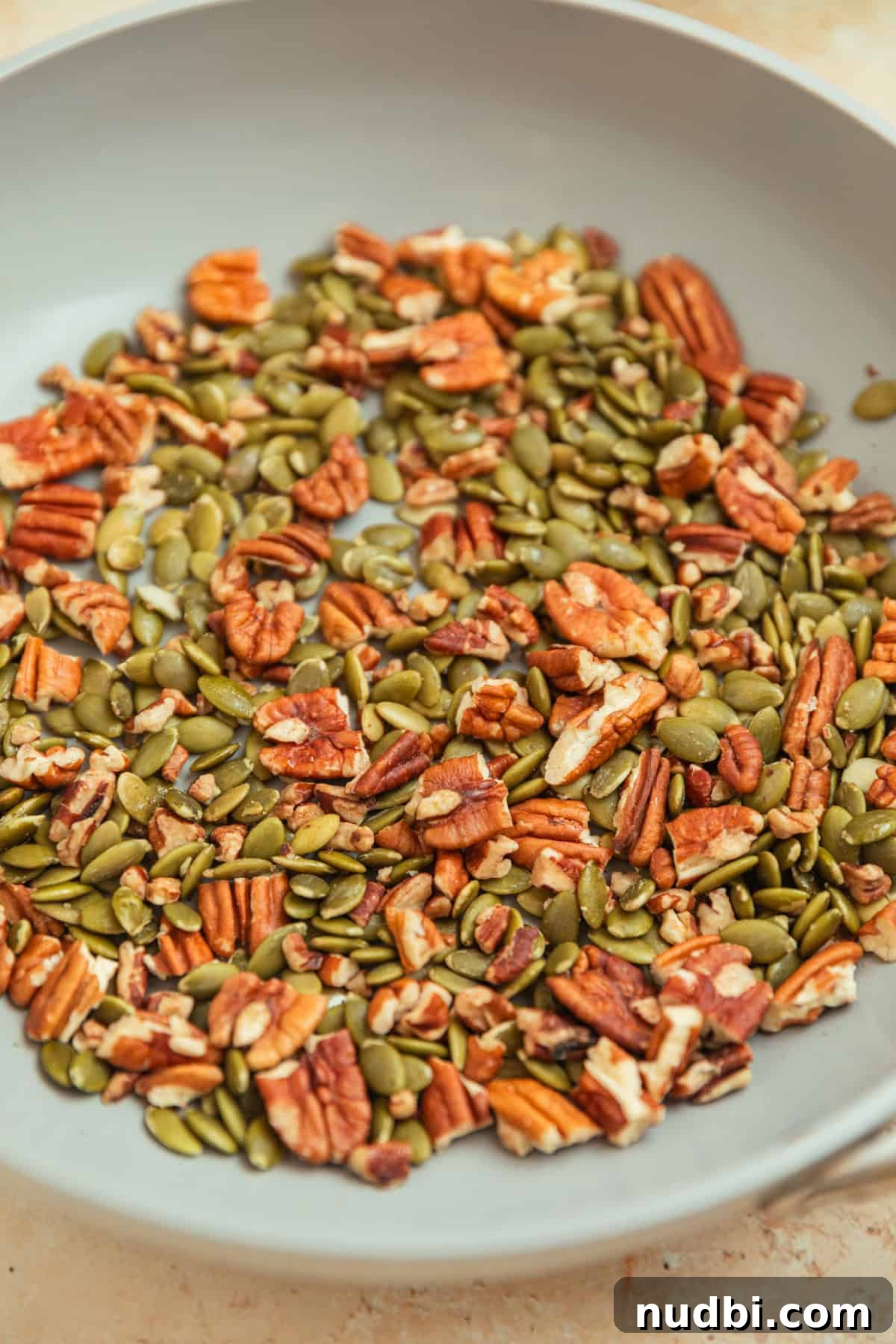 Roasted Sweet Potato and Kale Salad with Maple Dijon Dressing 8 Toasted pecans and pepitas in skillet.