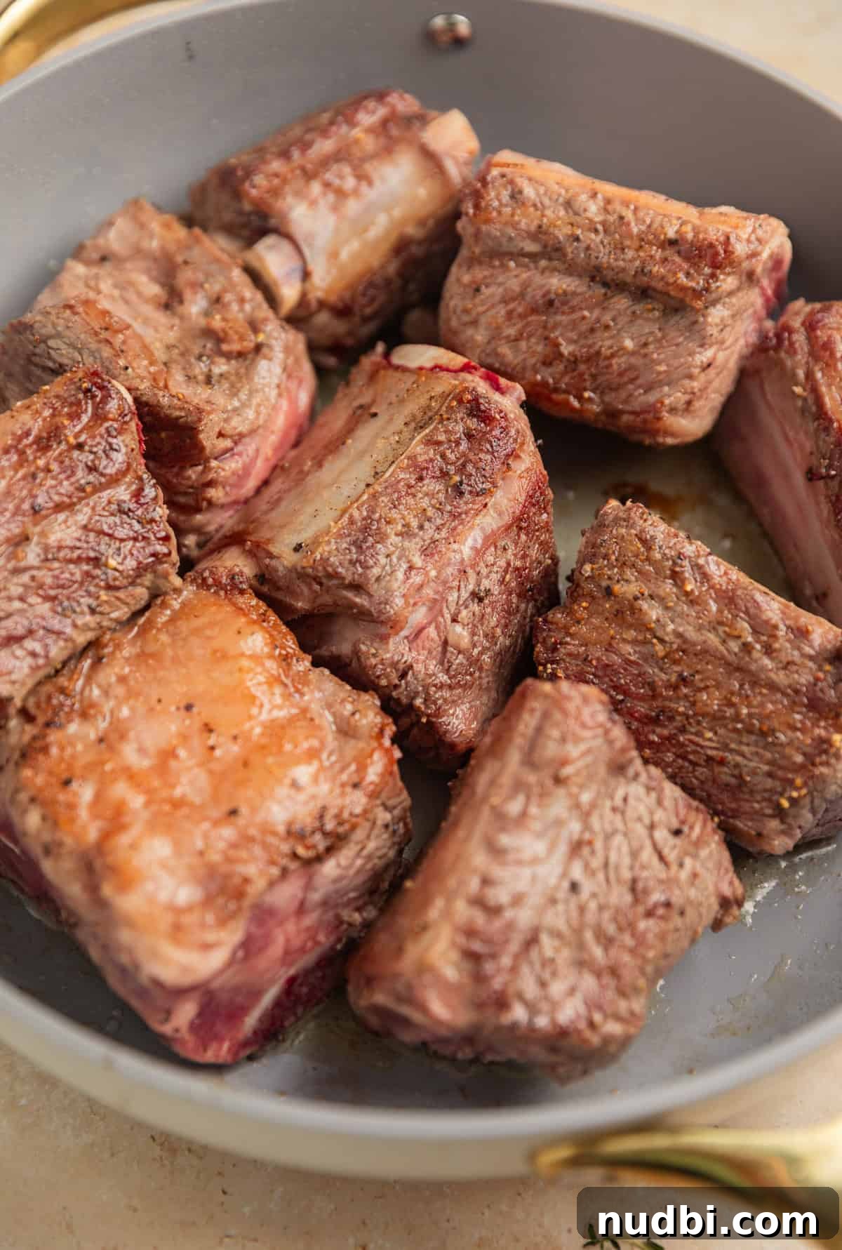 Slow-Cooker Red Wine Braised Short Ribs for Dinner 6 Seared short ribs in skillet.