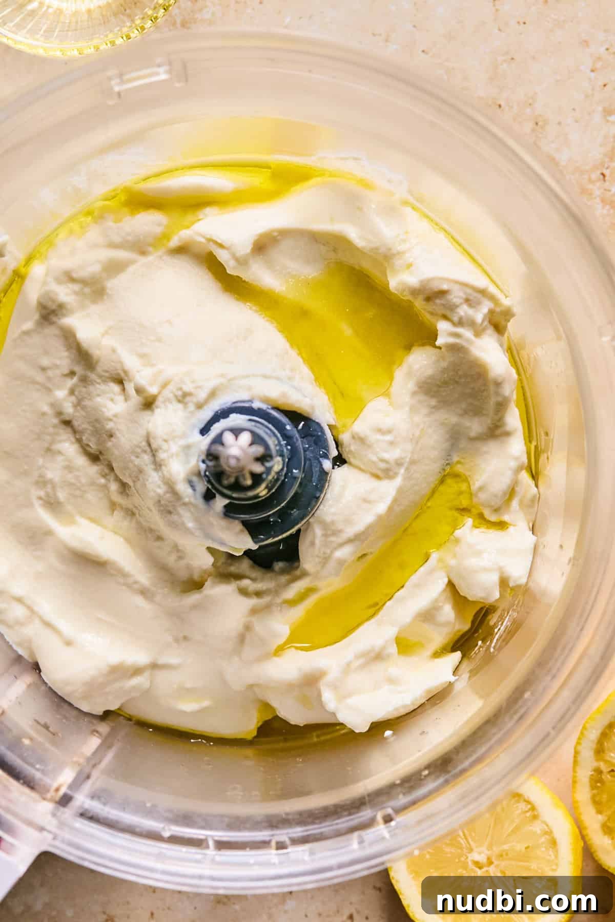 Creamy Whipped Ricotta Dip Recipe for Entertaining 5 Ricotta, olive oil and sea salt in food processor before whipping.
