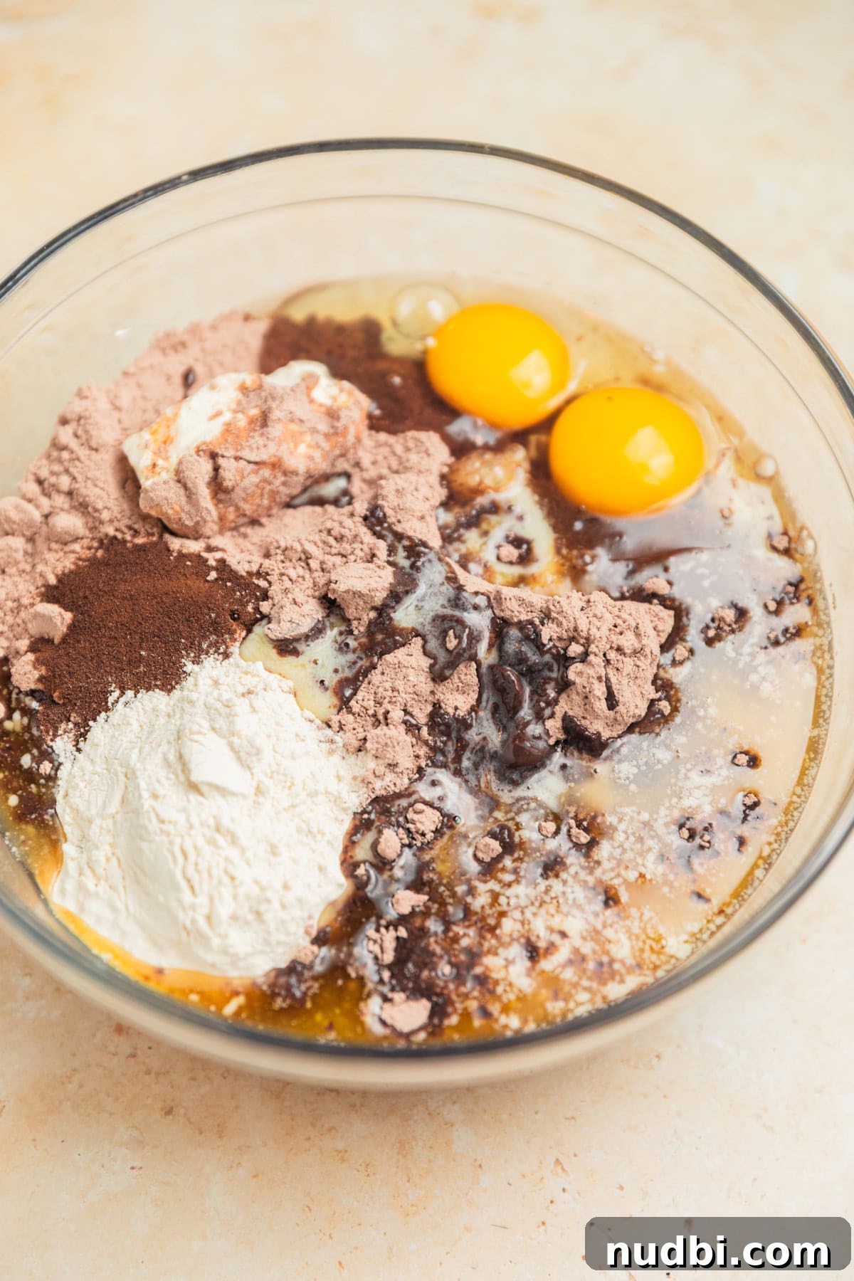 Chewy Brownie Mix Cookies Recipe for Rich Chocolate Treats 5 Brownie mix, eggs, flour, butter and other ingredients in mixing bowl.