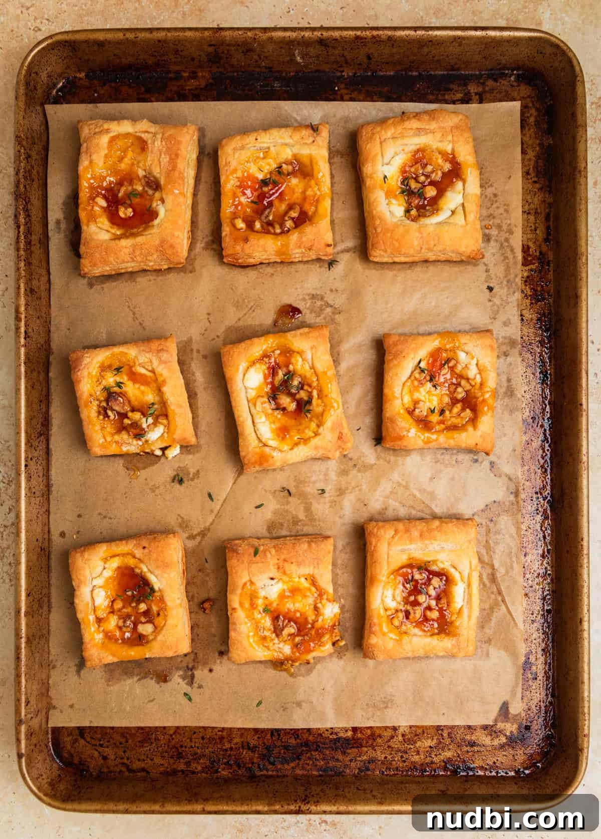 Crispy Goat Cheese Puff Pastry Tart Recipe 8 Baked puff pastry with apricot and goat cheese topped with walnuts and thyme.