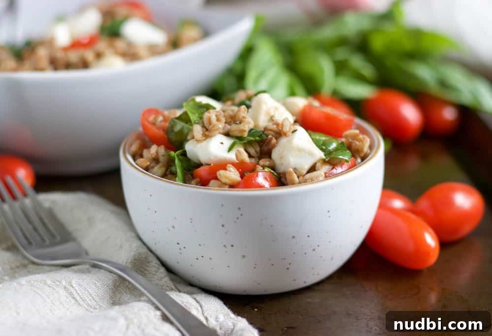 Caprese Farro Salad with Cherry Tomatoes, Basil & Mozzarella 5 Caprese Farro Salad in bowl.