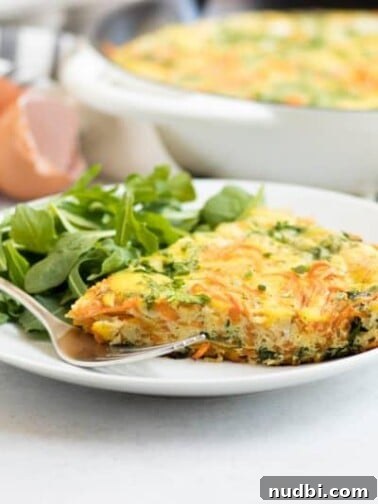 Spiralized Sweet Potato Baby Arugula Frittata. Farm fresh eggs, packed with veggies and freshly grated Parmesan cheese. Breakfast will be at its best. #fritatta #breakfast #spiralizer