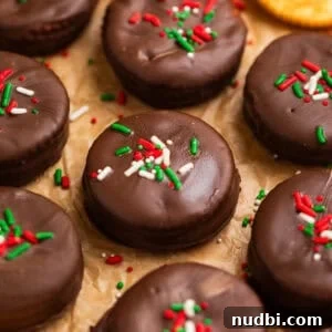 Ritz Cracker Cookies Stuffed with Reese's Cups 14 Chocolate dipped ritz crackers with reese cup centers.