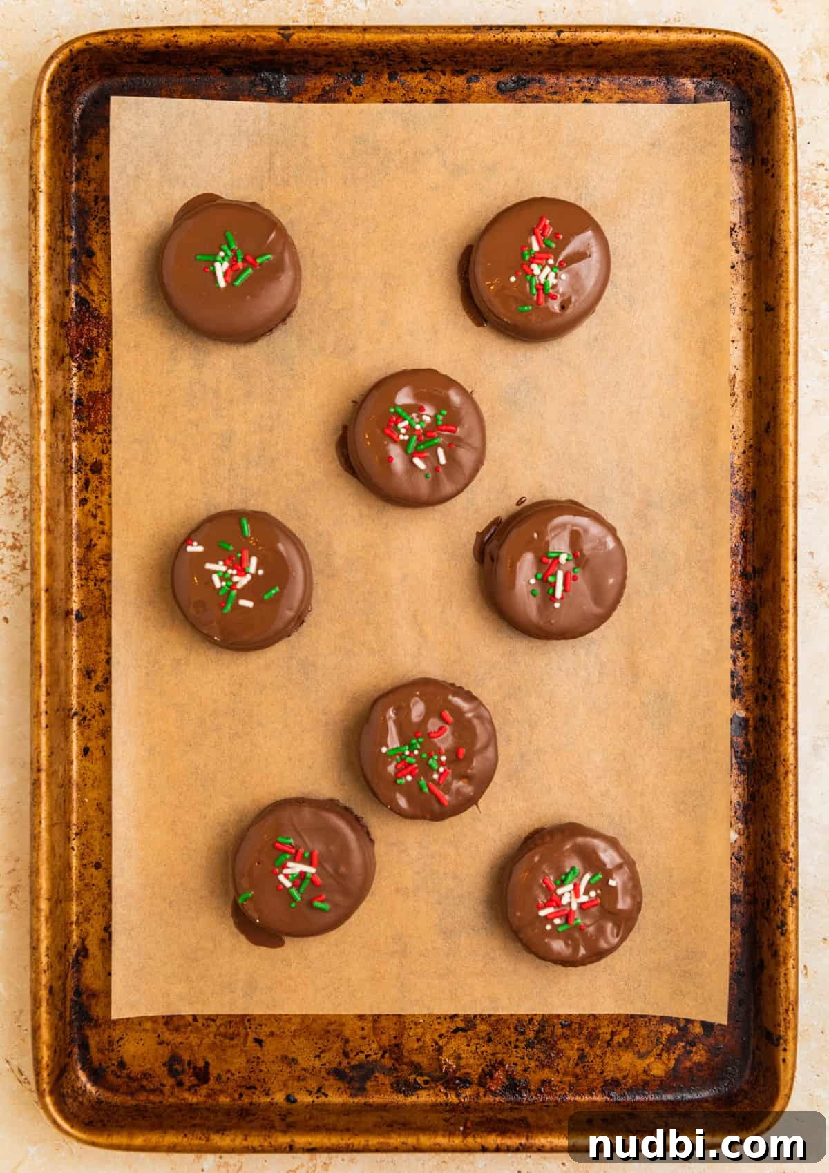 Ritz Cracker Cookies Stuffed with Reese's Cups 8 Ritz cracker cookies dipped in chocolate with sprinkles over top.