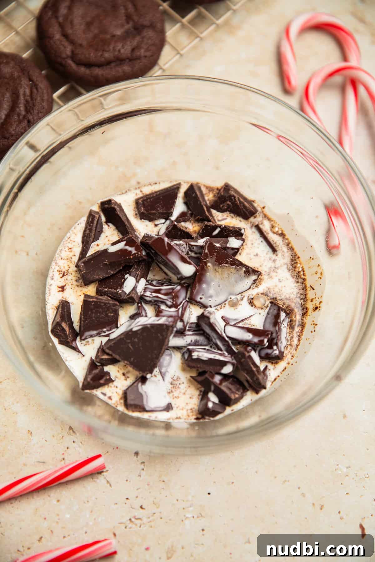 Peppermint Mocha Cookie Recipe — Chocolate Coffee Holiday Cookies 12 Hot cream added to chopped chocolate in bowl.