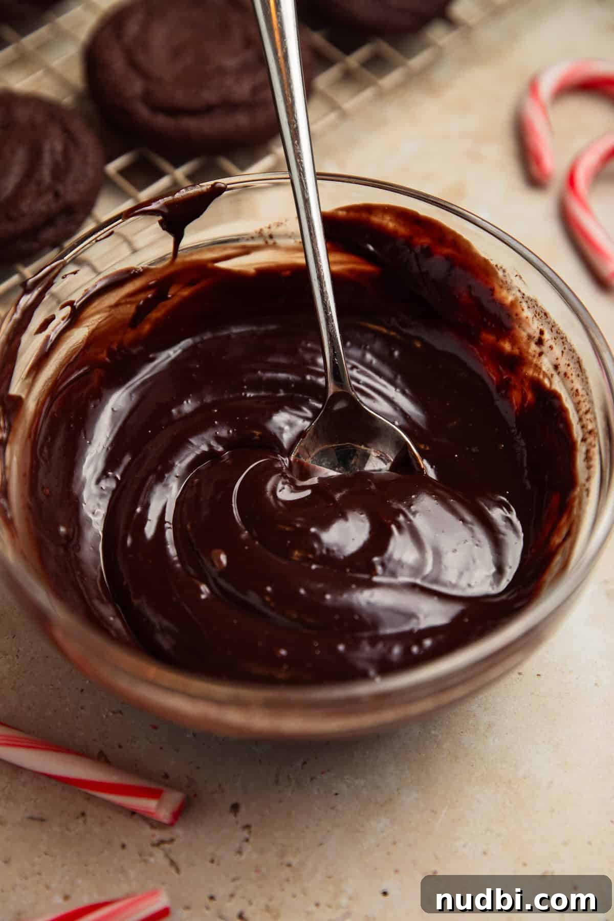 Peppermint Mocha Cookie Recipe — Chocolate Coffee Holiday Cookies 13 Dark chocolate espresso ganache in bowl with spoon.