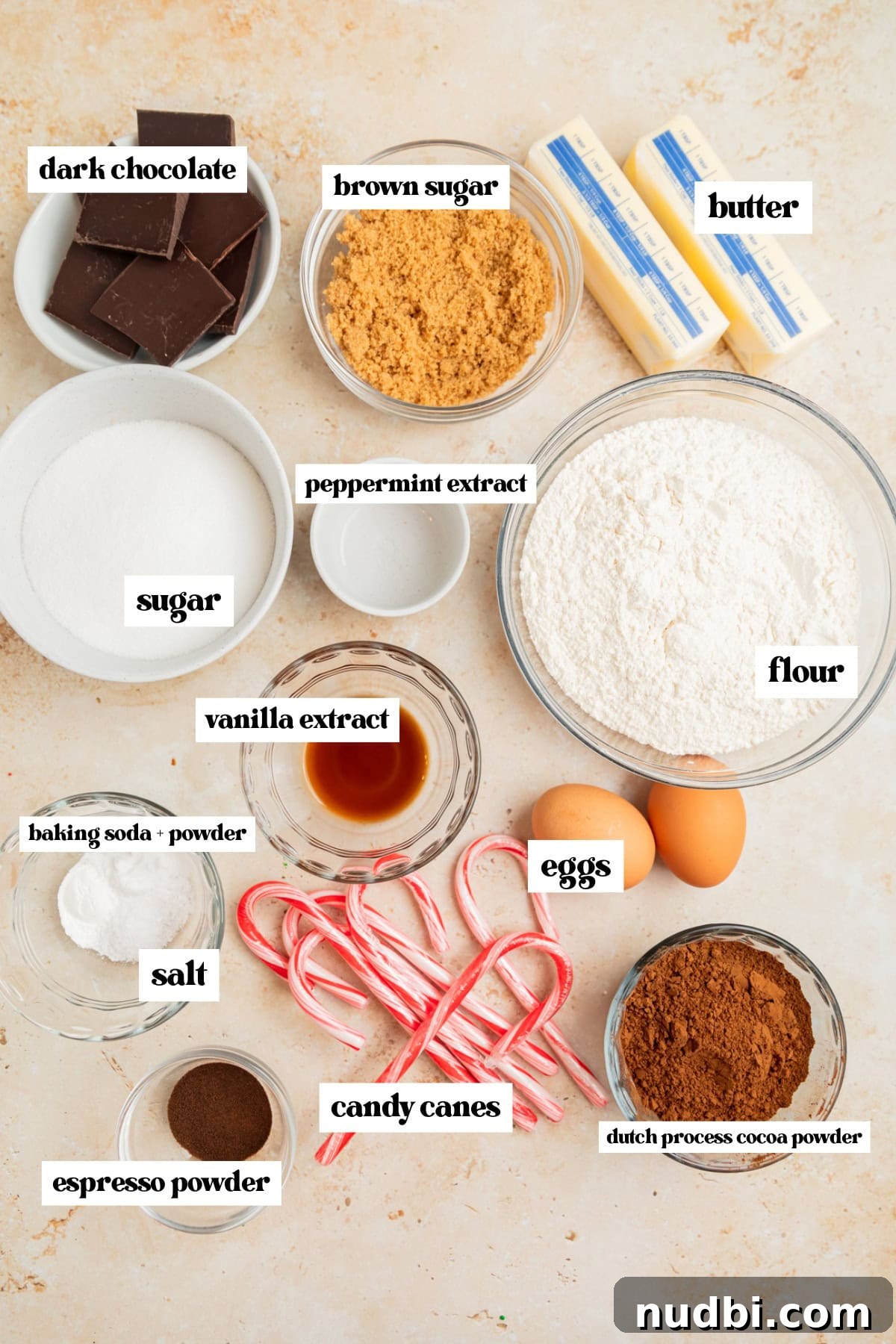 Peppermint Mocha Cookie Recipe — Chocolate Coffee Holiday Cookies 4 Flour, eggs, cocoa powder, espresso powder and other ingredients arranged on surface.