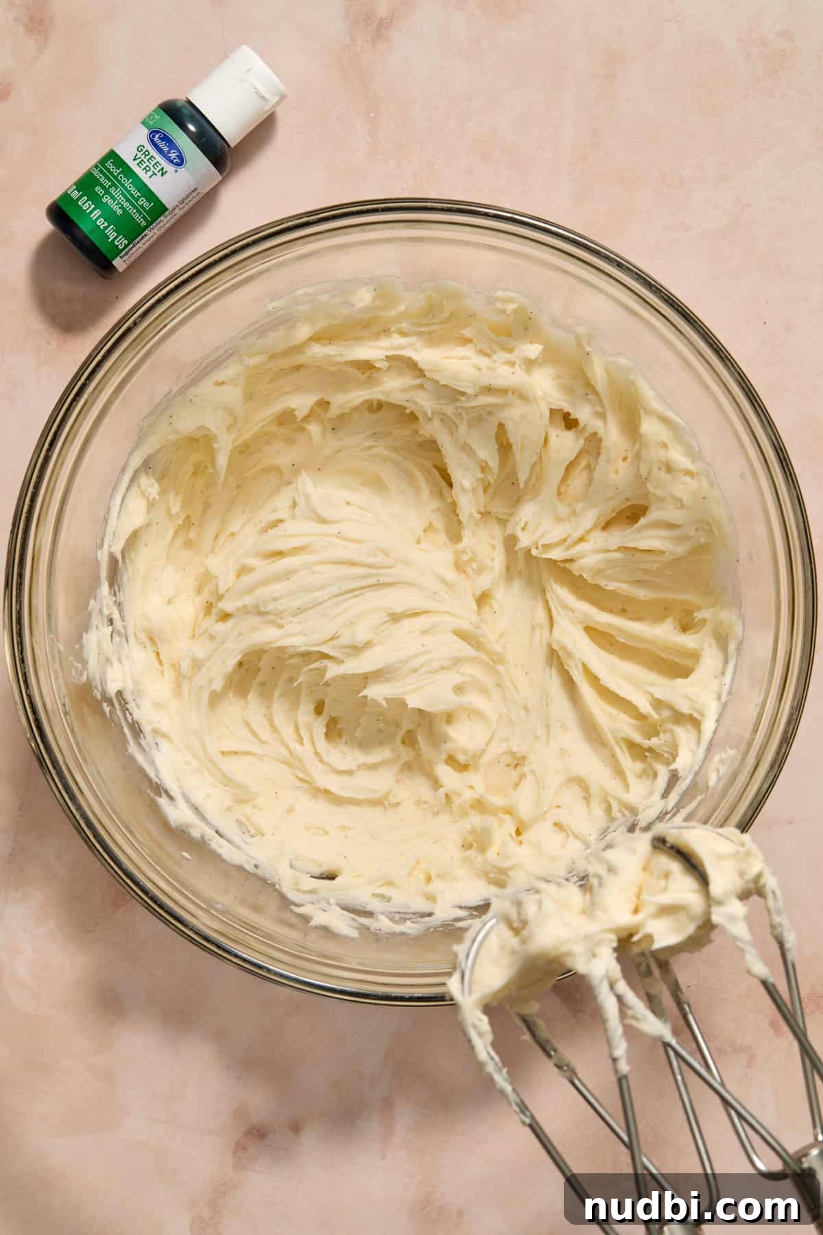 Christmas Sugar Cookie Bars Recipe with Festive Frosting 11 Buttercream frosting whipped in bowl.