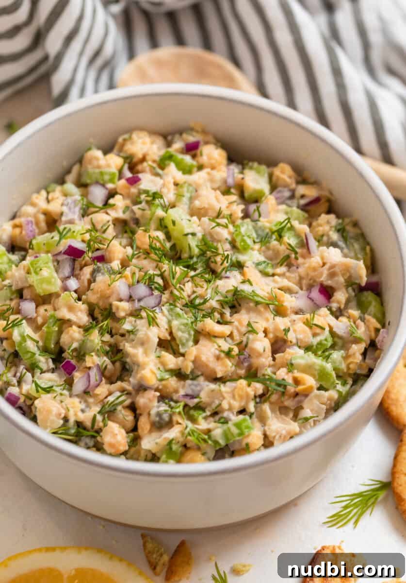 Vegan Chickpea Tuna Salad Recipe — Creamy Plant-Based Lunch 8 Vegan chickpea mock tuna salad in bowl with fresh dill.