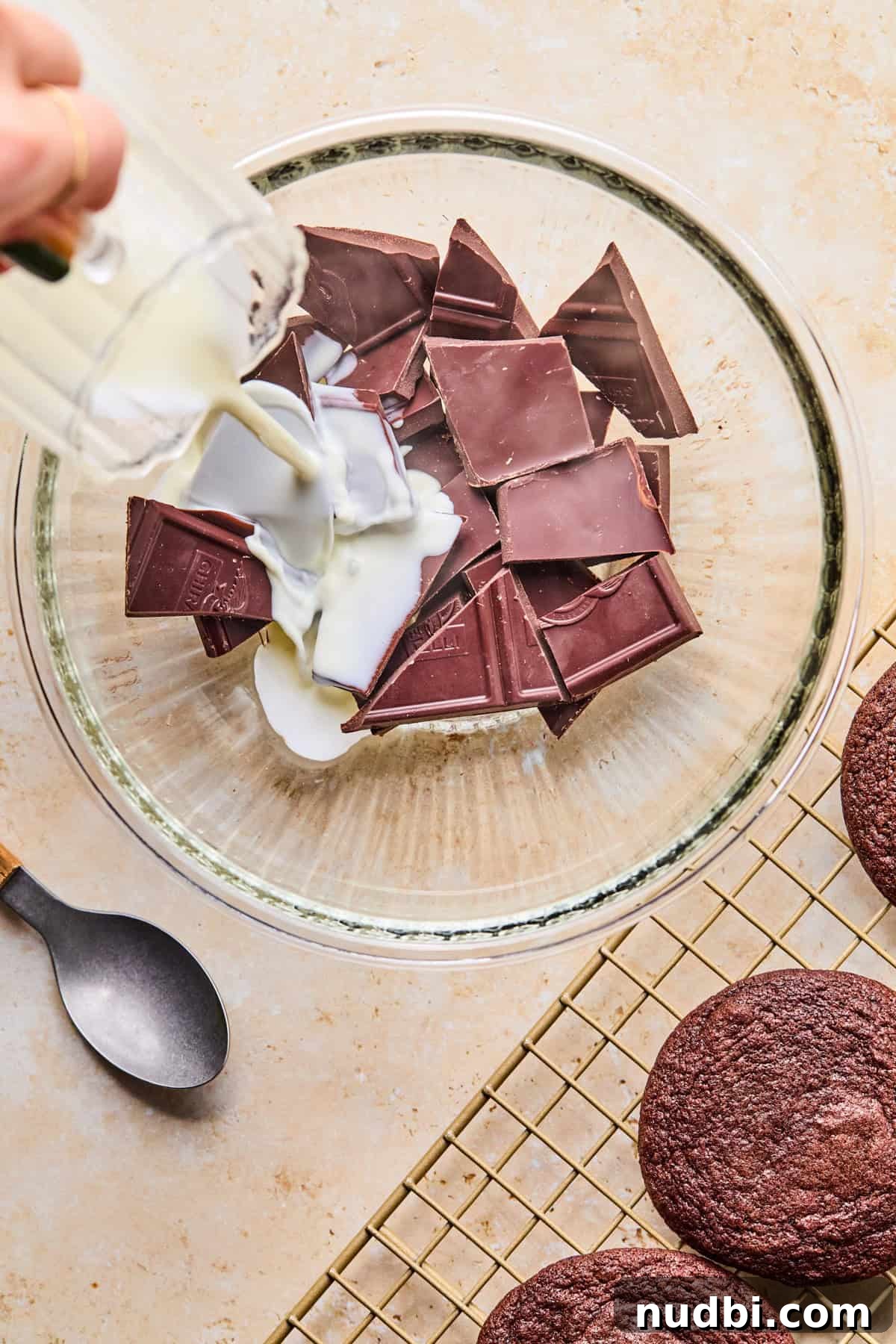Cosmic Brownie Cookie Recipe: Fudgy, Colorful Chocolate Cookies 12 Heavy cream poured onto chopped chocolate.